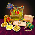 Premium Lohri gift hamper in a 2 tier wooden basket with potlis, Shalimar gajak and peanut chikki.