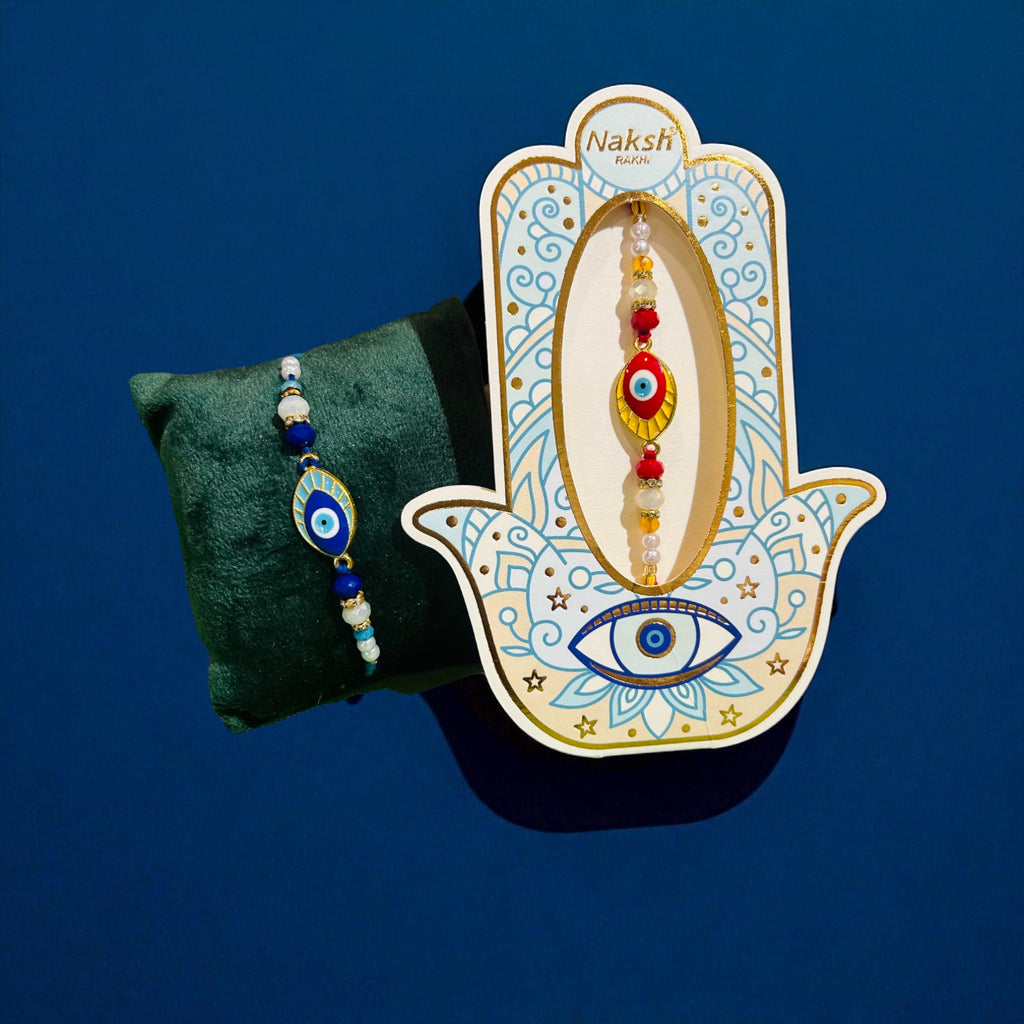 Evil eye rakhi with eye-shaped metal charm on decorative thread, includes roli chawal – Wrap Shap Raksha Bandhan collection