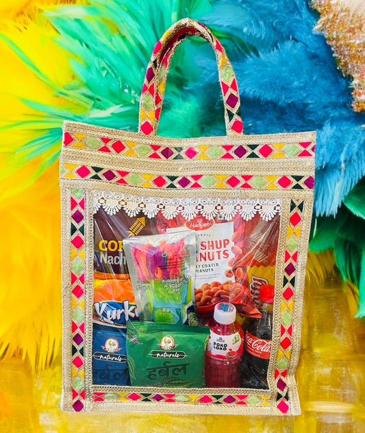 Holi Celebration Gift Hamper – Gulal, Snacks, Drinks & Holi T-Shirt in a Decorative Jute Bag