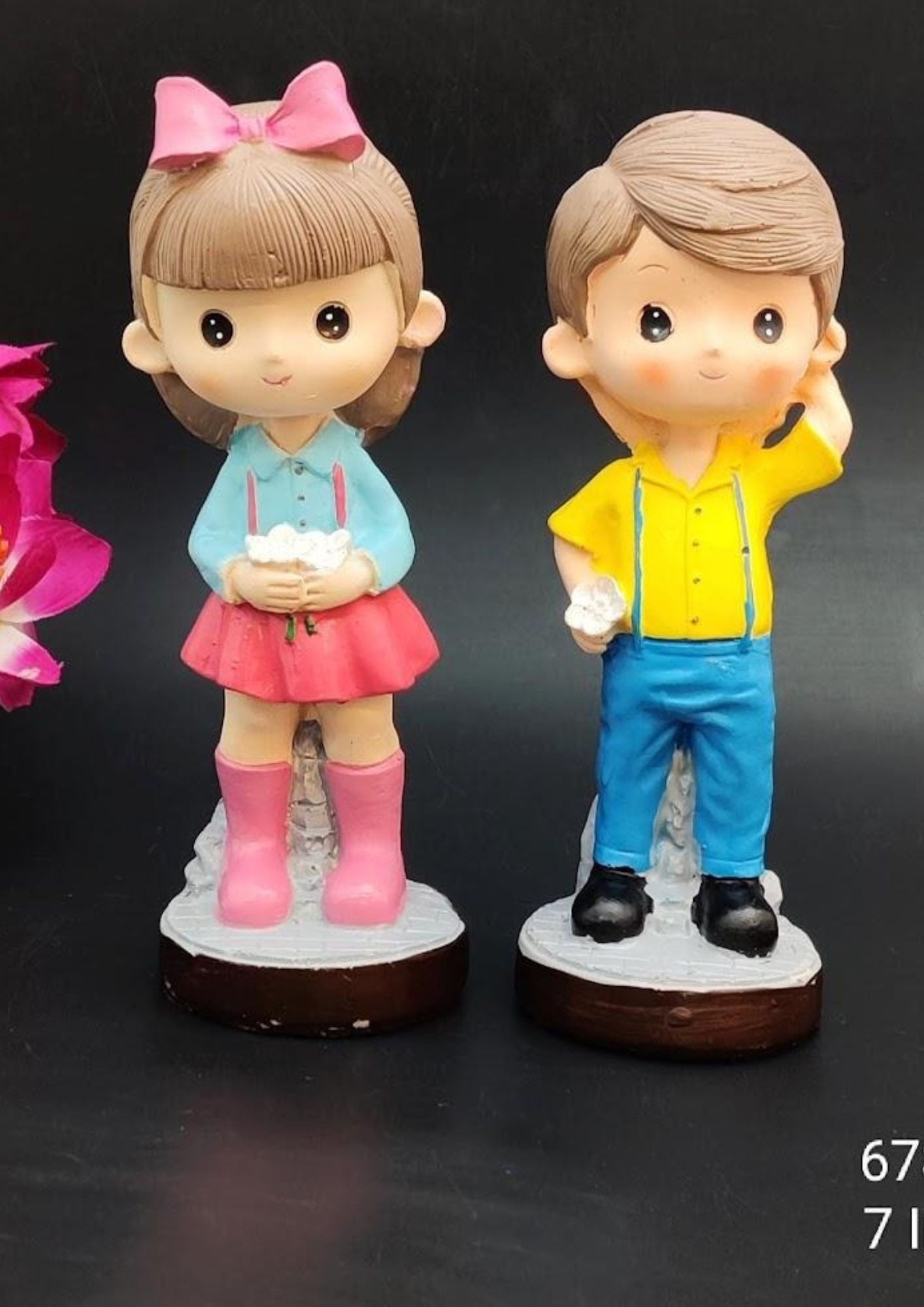 7-inch figurines of a boy and girl holding flowers, hand-painted resin set with the girl in pink and blue and the boy in yellow and blue, decorative gift item.