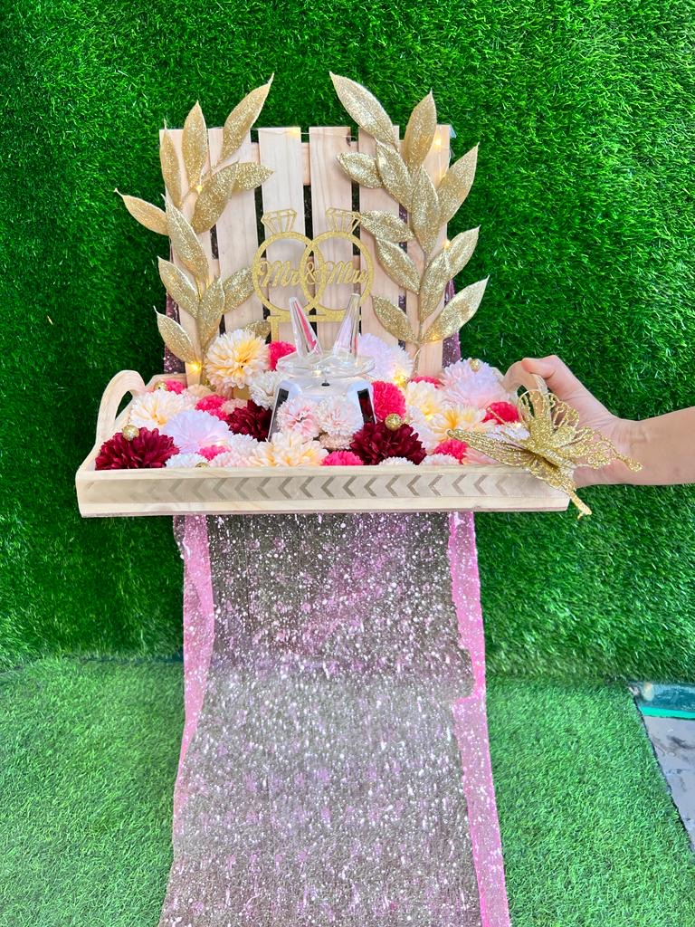 Elegant Engagement Ring Platter with Rotating Ring Holders and Multicolor Carnation Flowers