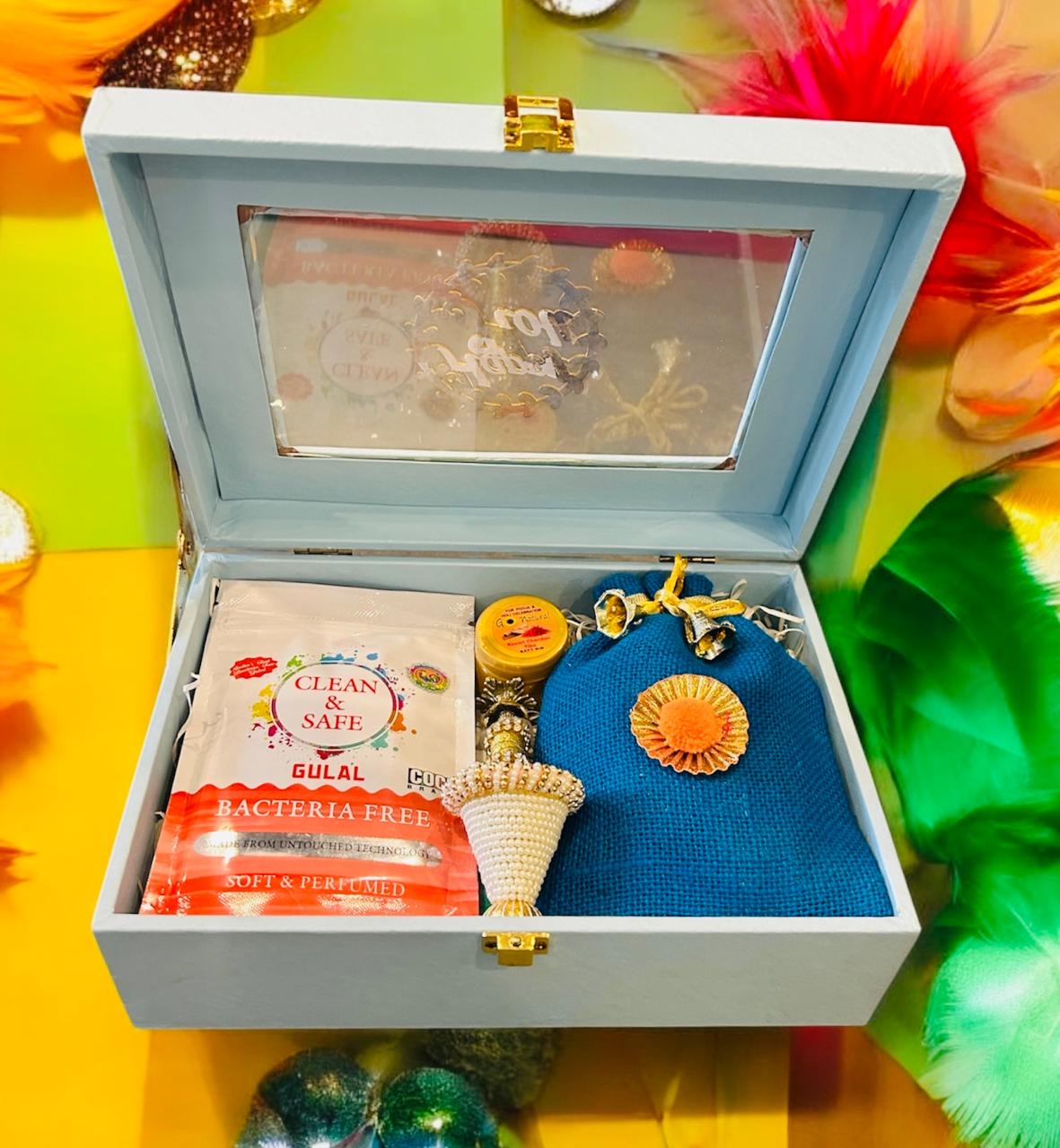 Holi Gift Hamper – Gujiya, Organic Gulal, Chandan Tikka & Balti Pichkari in a Decorative Trunk Box