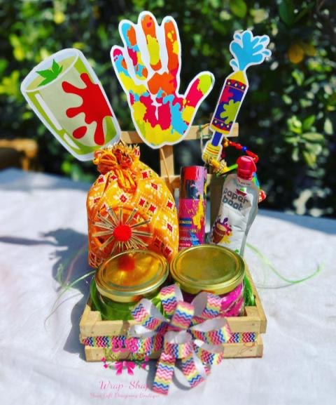 Holi Bliss Hamper: Gujiya Potli, Herbal Gulal Jars, Color Shots, and Thandai in Pinewood Basket