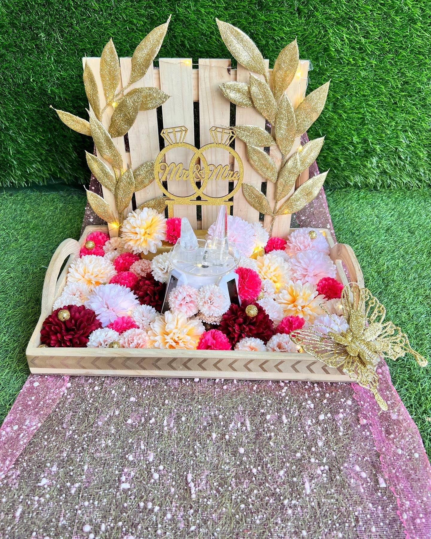 Elegant Engagement Ring Platter with Rotating Ring Holders and Multicolor Carnation Flowers