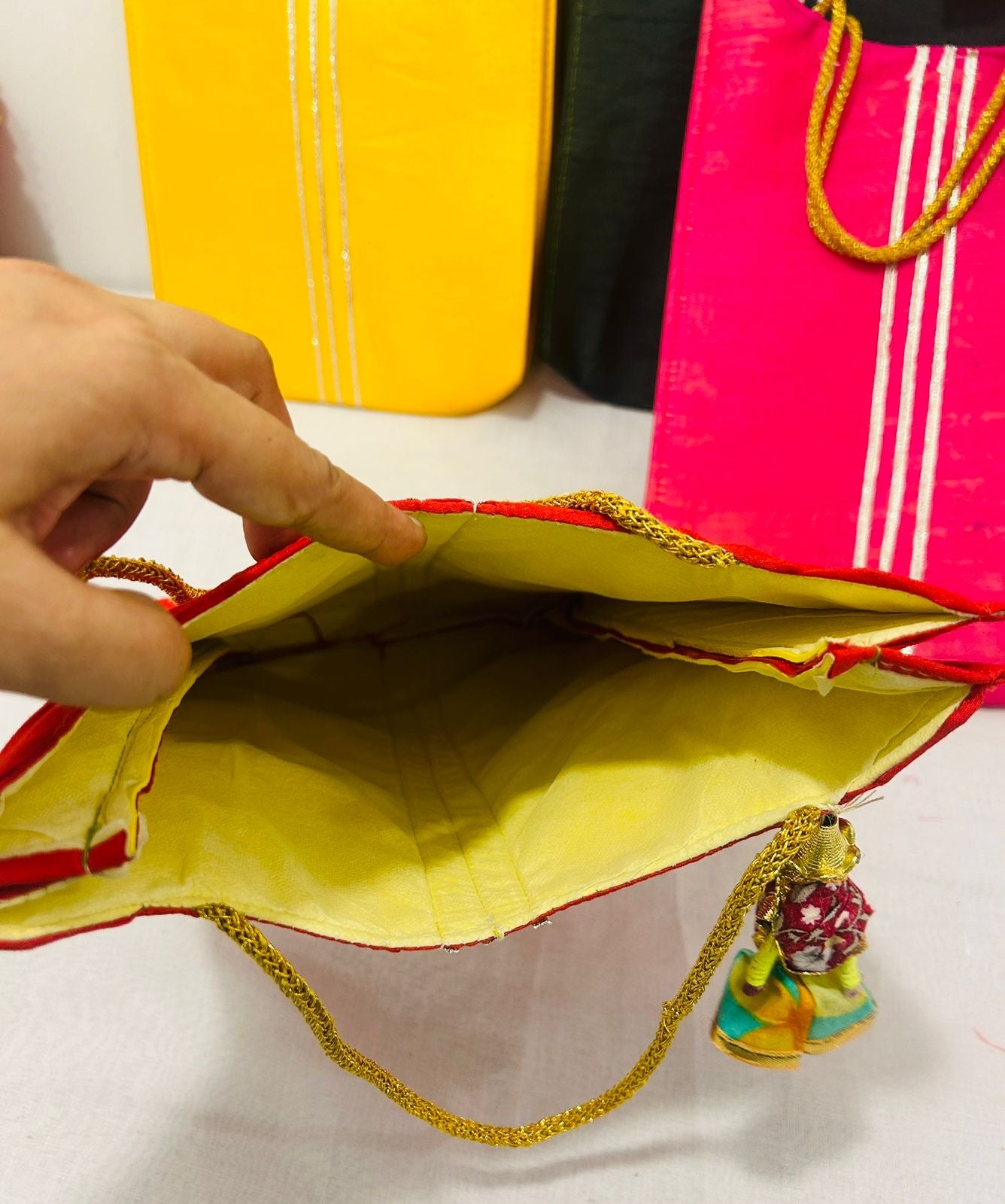 Ethnic Gifting Bags with Rajasthani Puppet Hanging – Assorted Colors | Wrap Shap