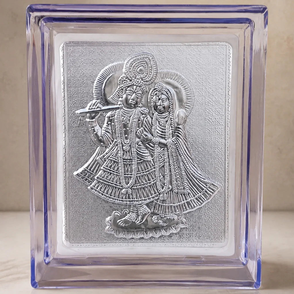 999 Silver Radha Krishna Frame by Wrap Shap with premium silver finish, ideal for wedding return gifts, housewarming gifts, pooja gifts, festive gifting, corporate gifts, and home décor.