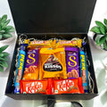 Premium assorted chocolate gift box featuring Dairy Milk Silk, Hershey’s Kisses, Kit Kat, Perk, and 5 Star with a personalized note for gifting.