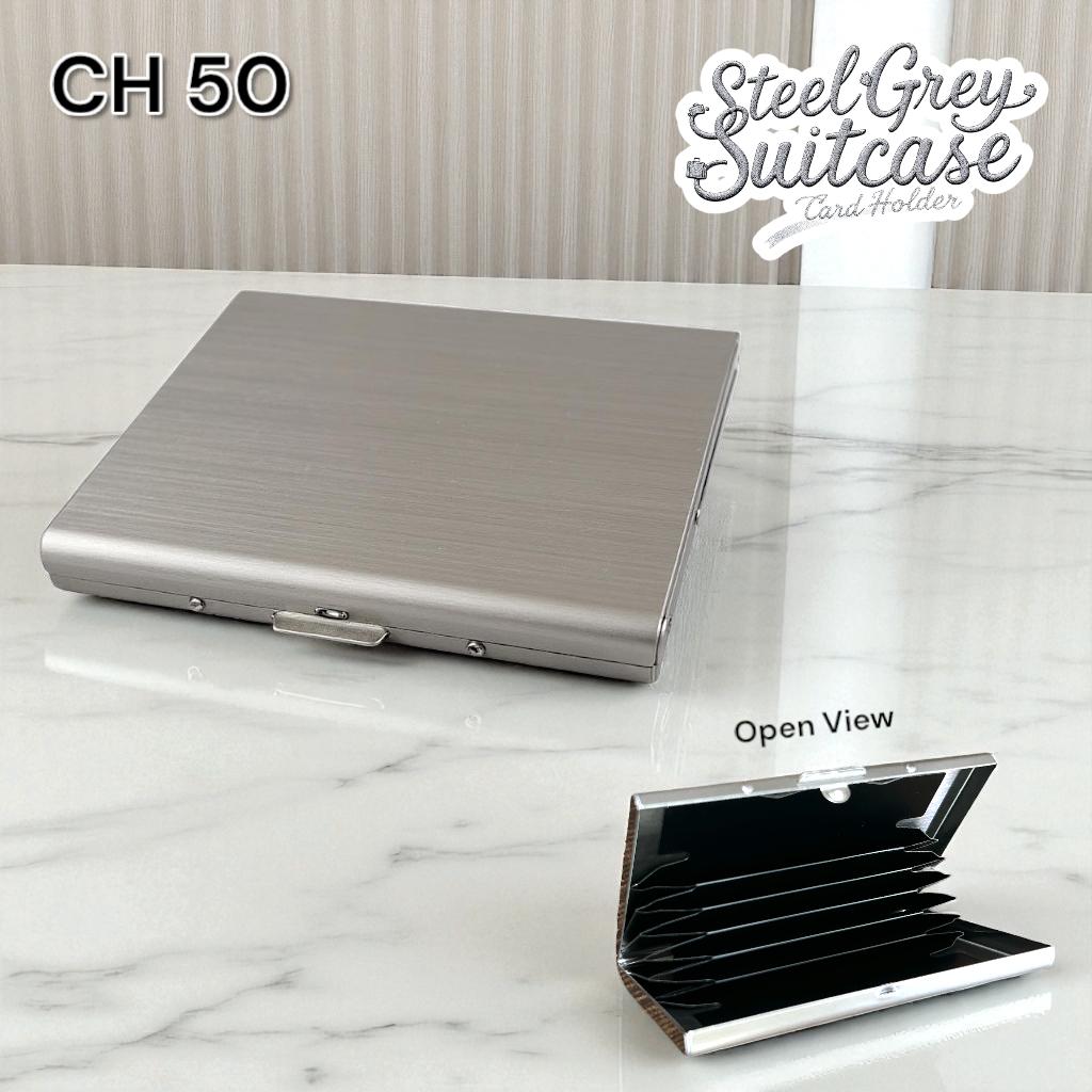 Retro travel-inspired steel silver metal card case with push-button access