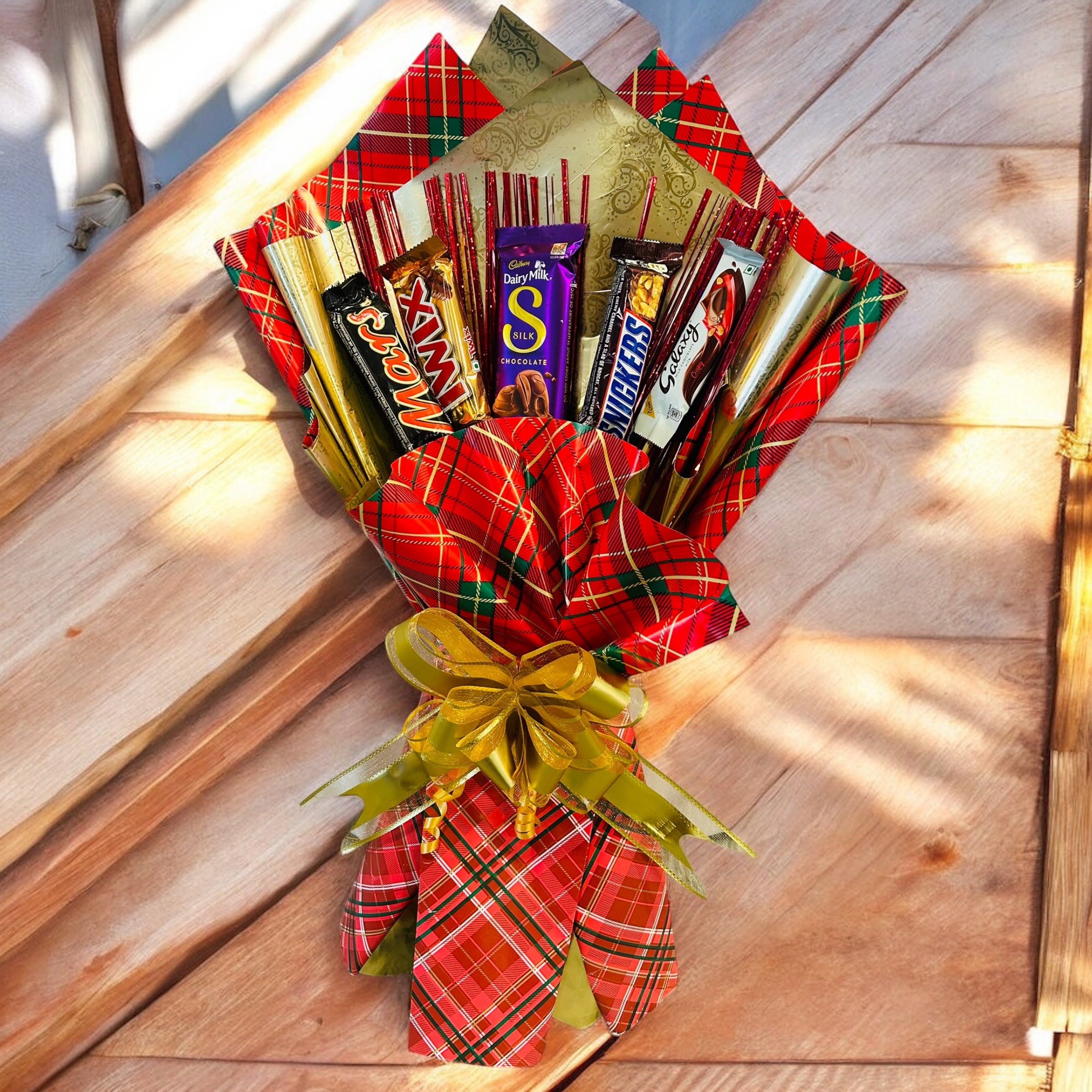 Beautifully arranged assorted chocolate bouquet featuring Mars, Twix, Snickers, Galaxy & Dairy Milk Silk – a perfect gift for special occasions.