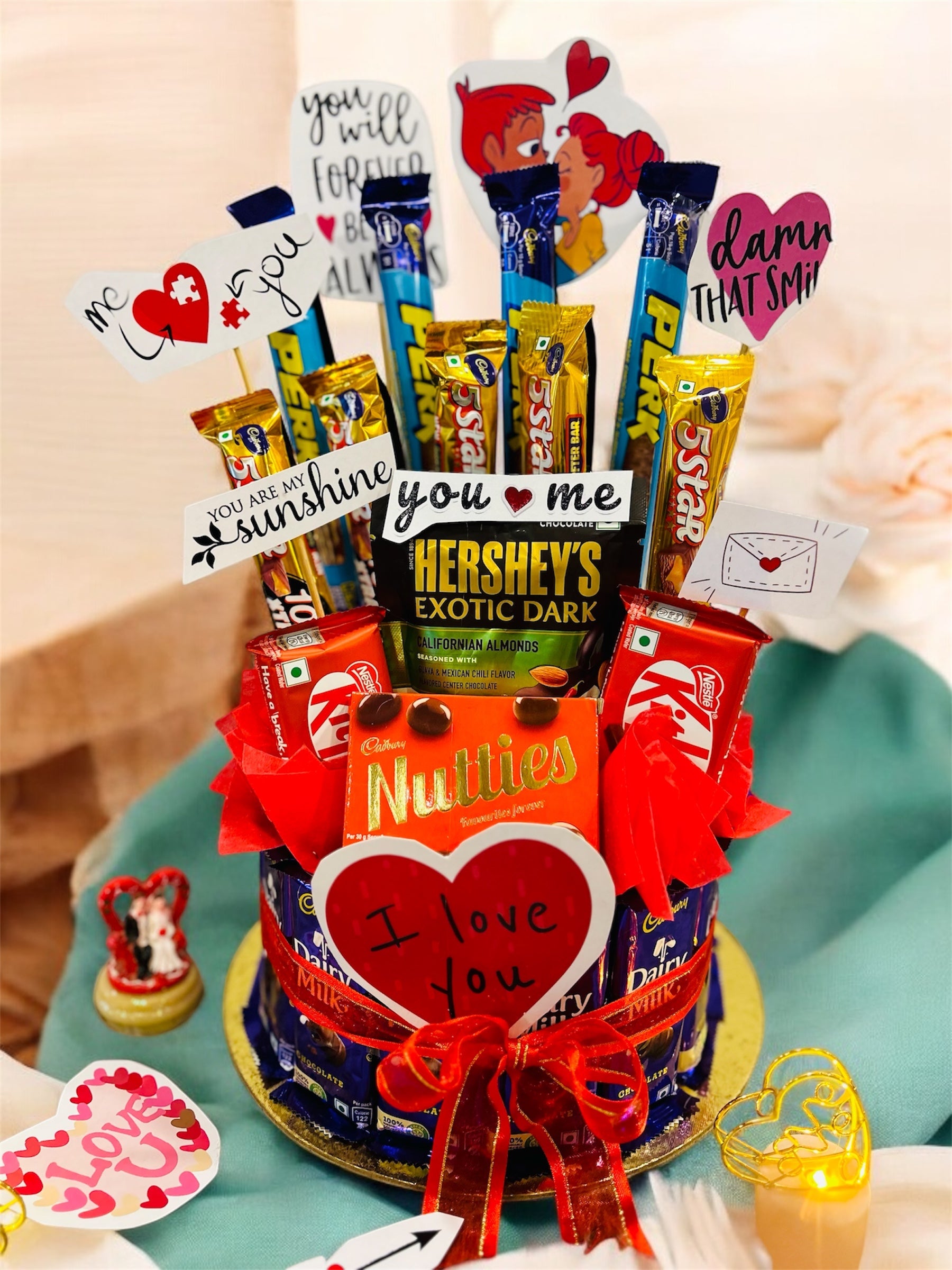 Chocolate bouquet hamper with Dairy Milk base, assorted chocolates, and love quotes, ideal for romantic occasions like Valentine’s Day, birthdays, and weddings.
