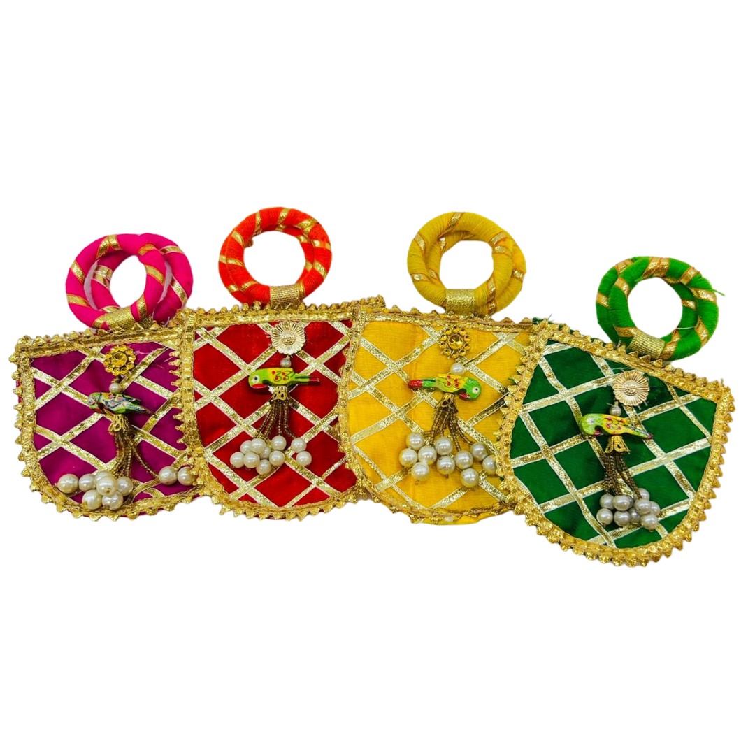 Luxury coin pouch for gifting gold coins, silver coins, and ginni in weddings, baby showers, and festive occasions with intricate detailing and drawstring closure.
