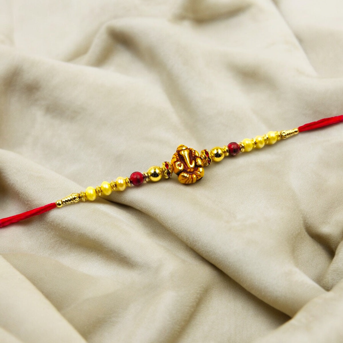 Wrap Shap Simple Dori Rakhi with Ganpati Design - Design 713 with Roli Chawal