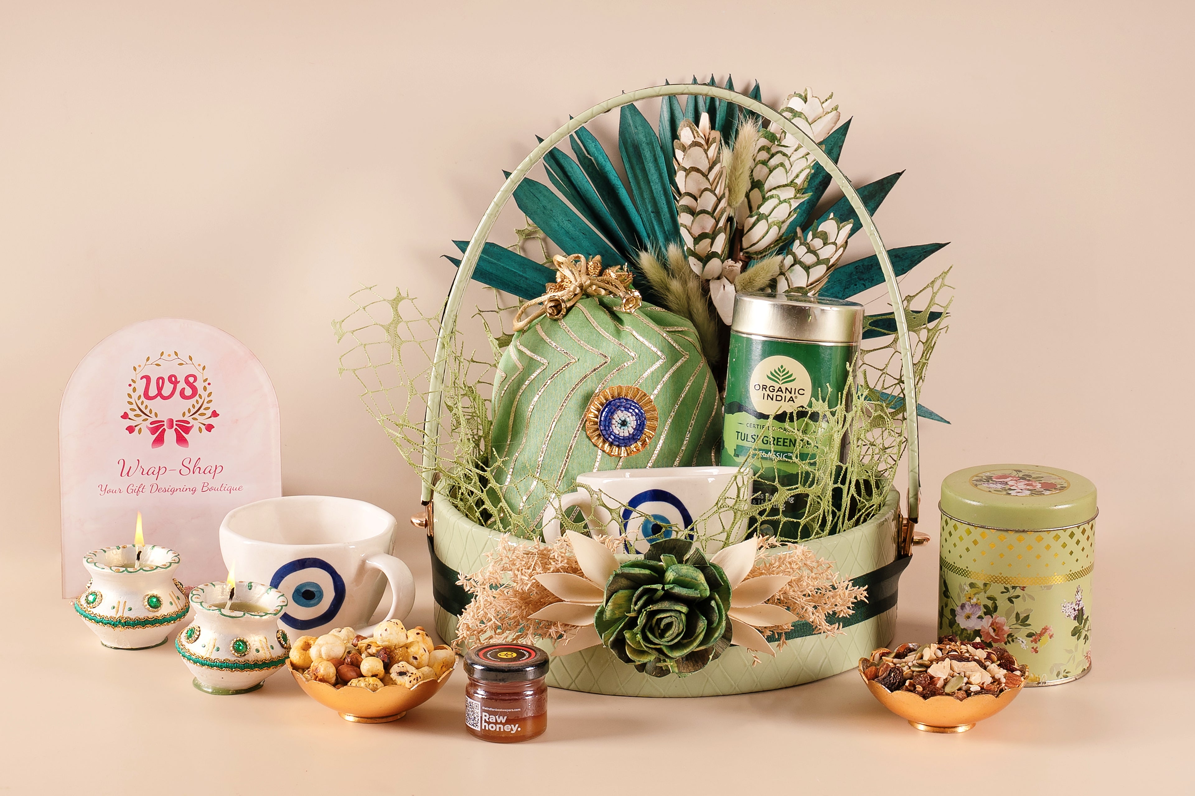 Dry Flower Decorated Leather Basket Hamper with Healthy Snacks, Green Tea, Honey & Tea Mugs | Wellness & Festive Gifting