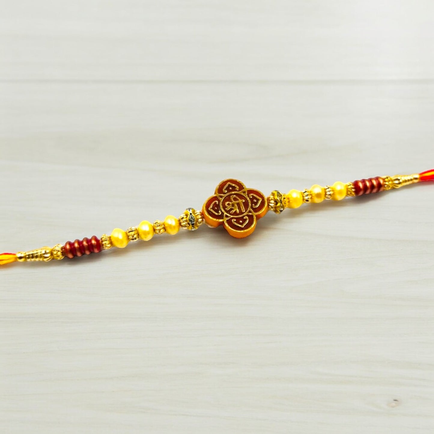 Wrap Shap Simple Beaded Dori Rakhi - Design 707 with Roli Chawal