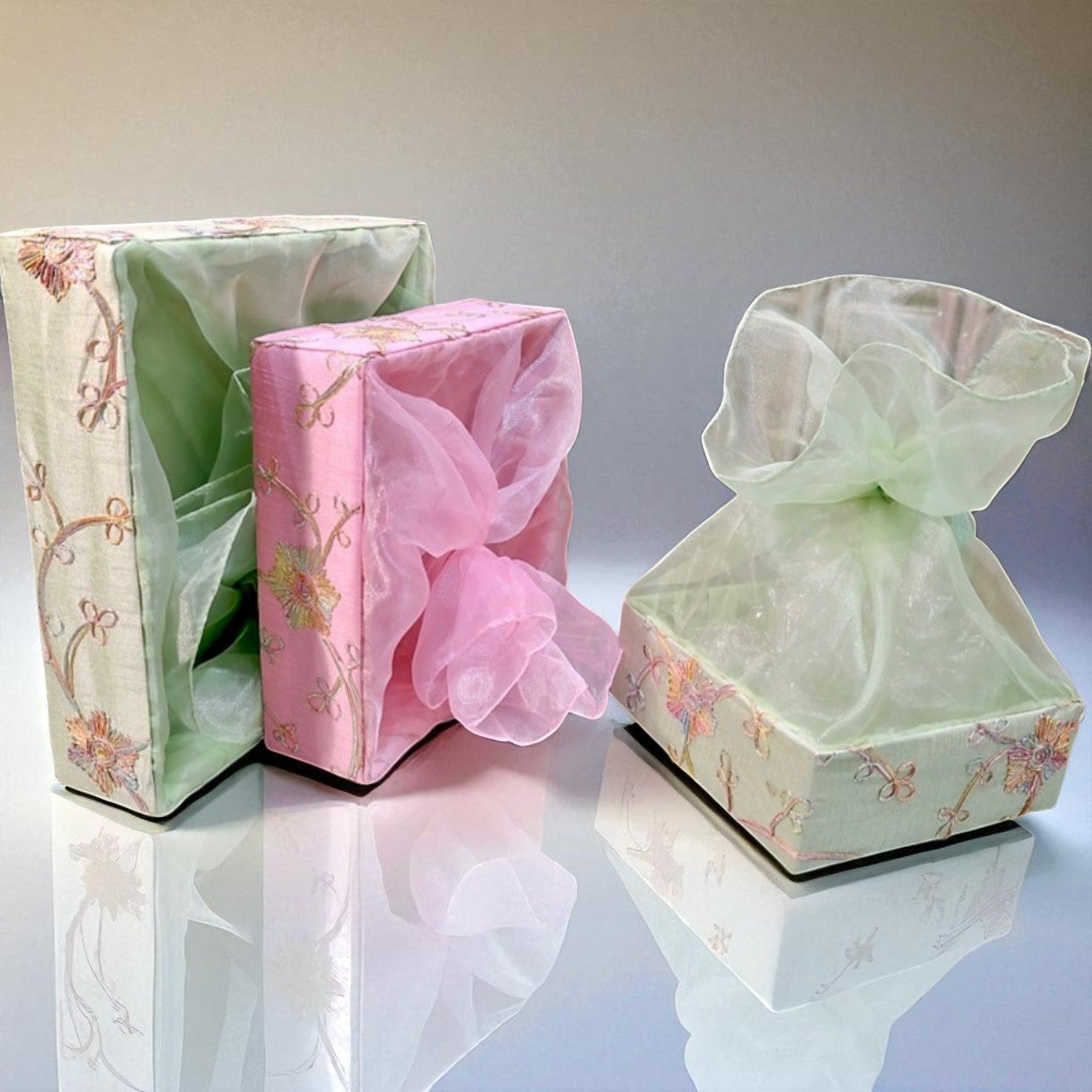 Square fabric gift basket with flower print in assorted colors by Wrap Shap, perfect for festive hampers