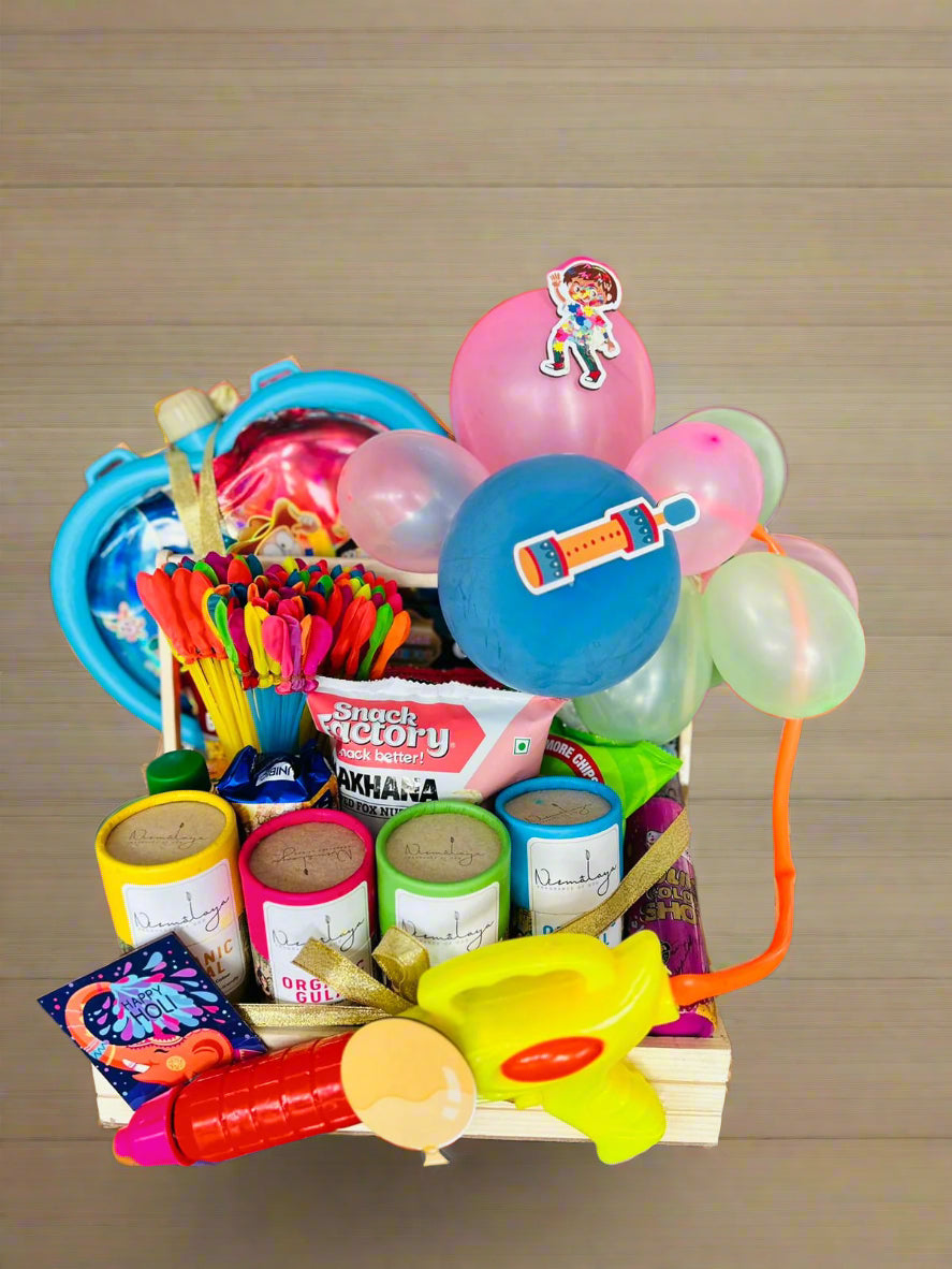 Holi Bliss Kid's Hamper: Herbal Gulal, Pichkari, Water Balloons, Color Spray, Chandan Tikka in Decorated Pinewood Basket