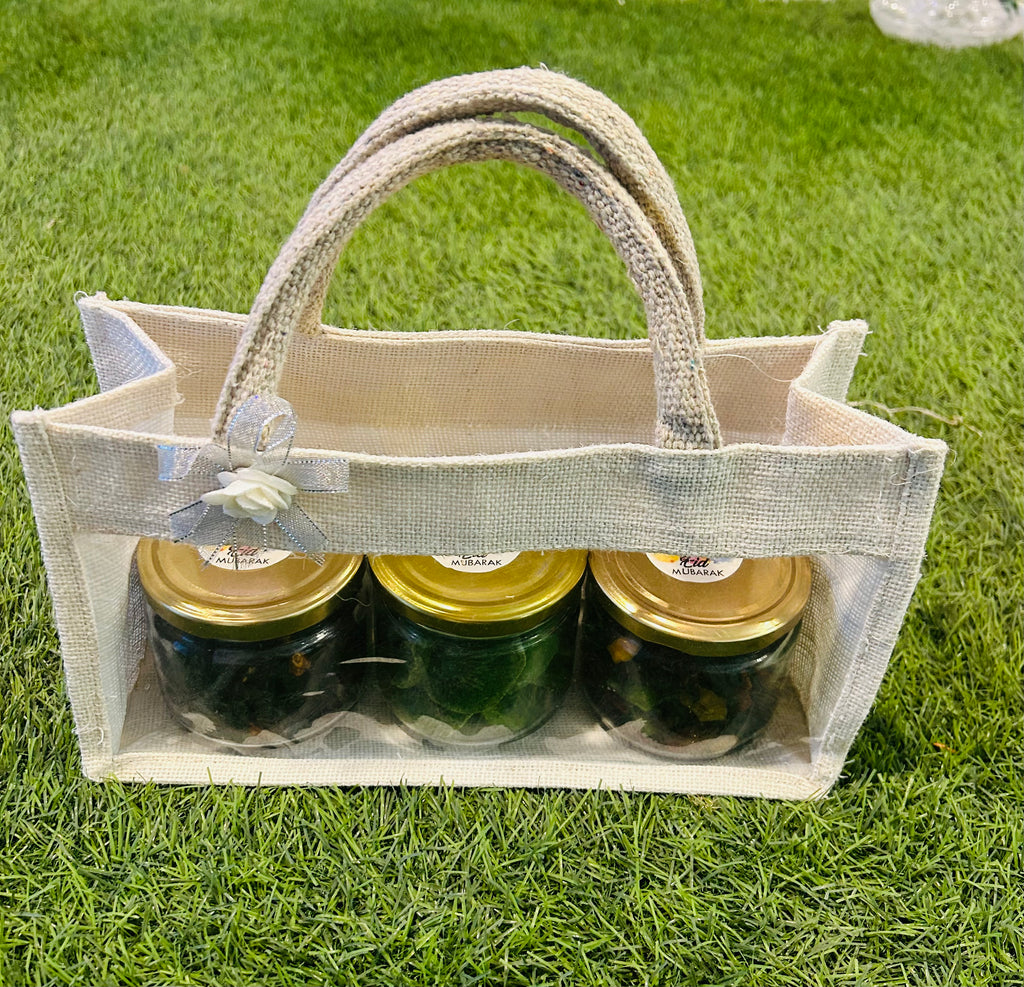 Eid Delights Gift Hamper: Dried Kiwi, Mixed Berries, and Dates in Jute Transparent Bag