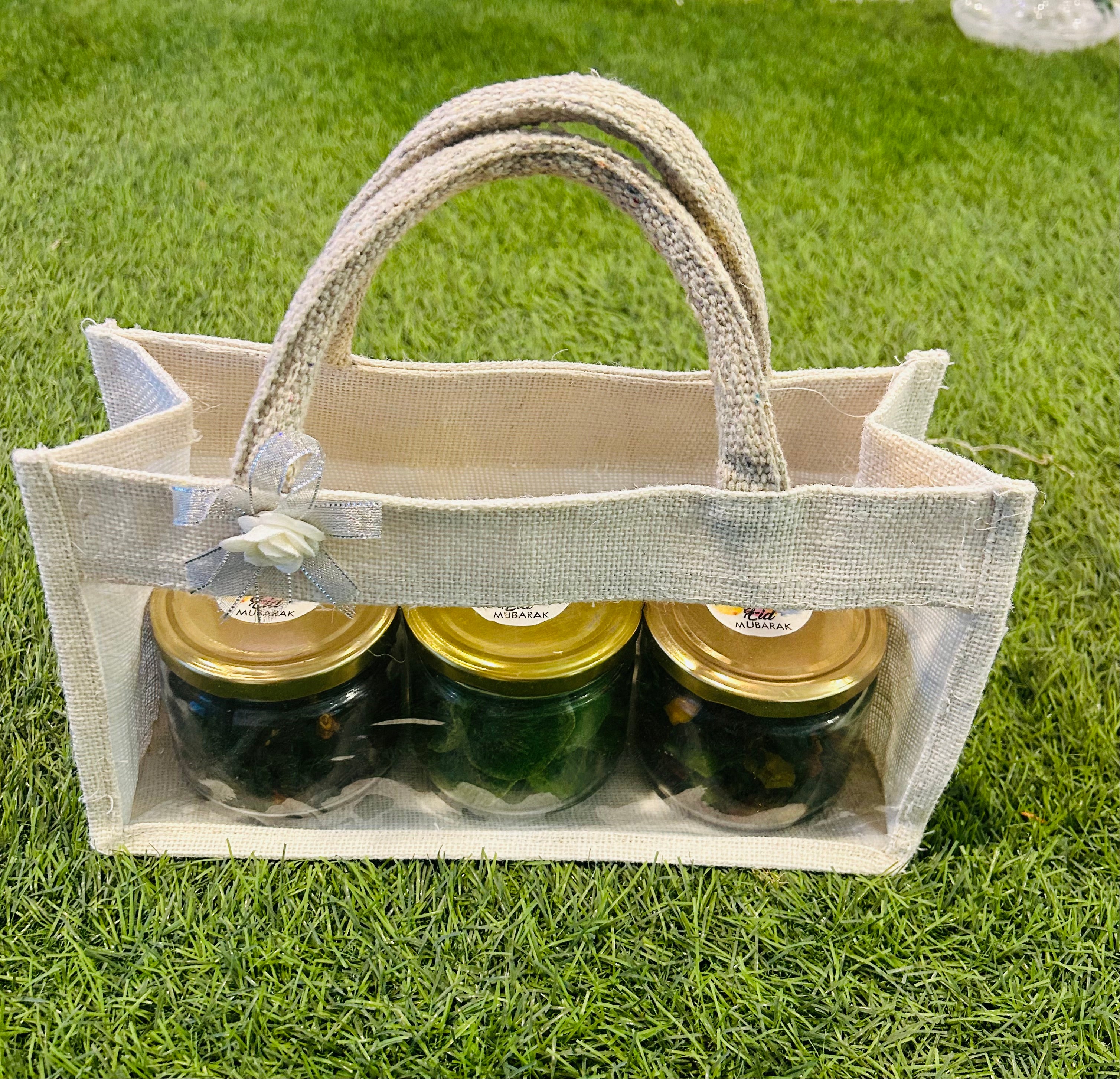 Eid Delights Gift Hamper: Dried Kiwi, Mixed Berries, and Dates in Jute Transparent Bag