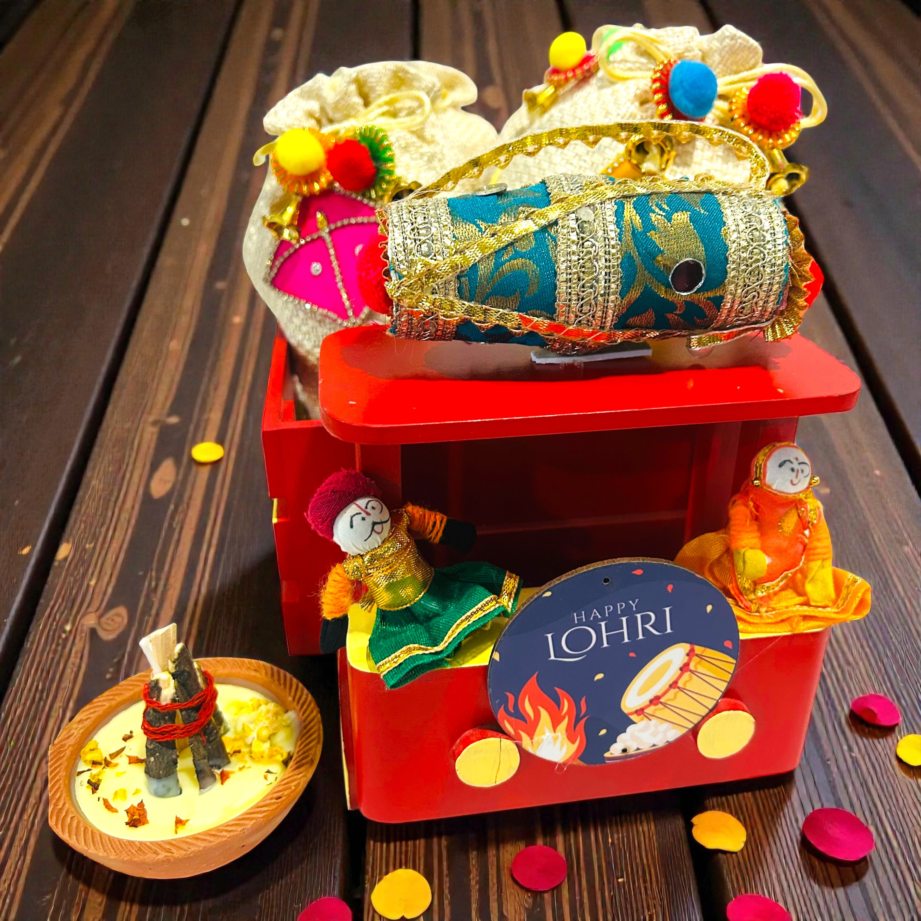 Wooden Truck Shape Lohri Gift Hamper – Kite Decorated Jute Potlis with Gajak & Snacks