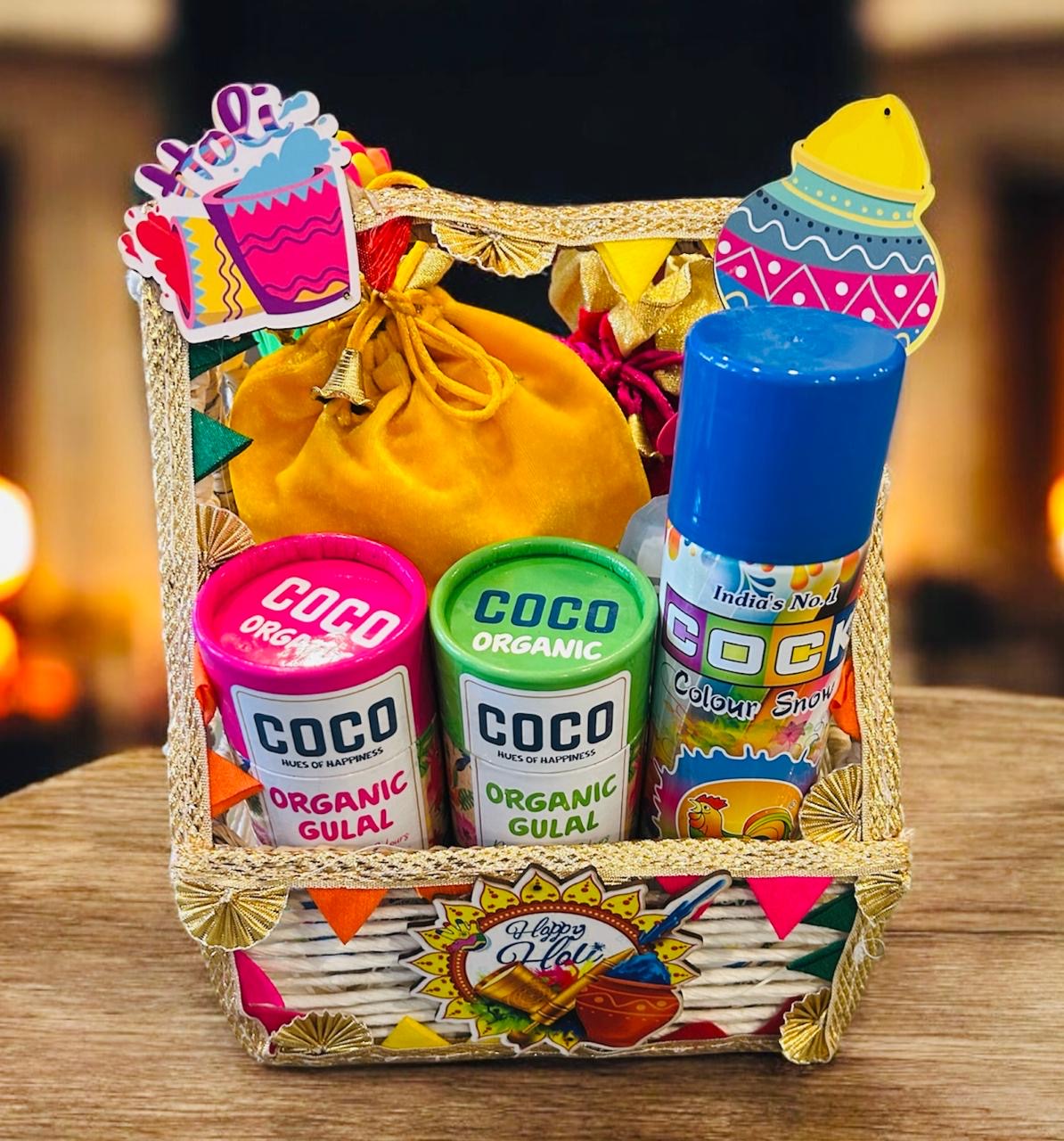 Holi-Gift-Hamper-Gujiya-Mathri-Thandai-Gulal-Rafia-Basket