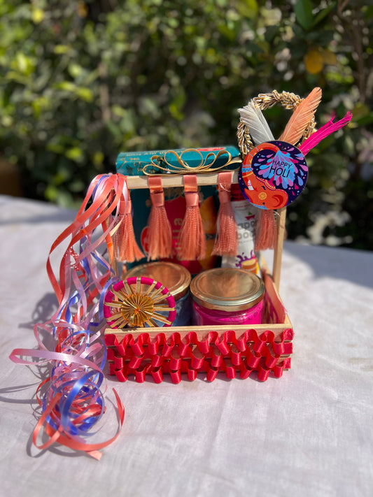 Holi Harmony Hamper: Herbal Gulal Jars, Gujiya, and Thandai in Decorated Pinewood Basket