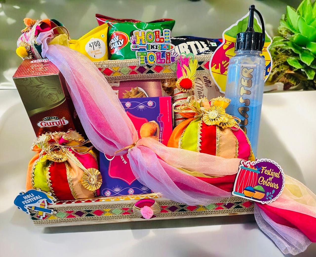 Holi-Gift-Hamper-Gulal-Pichkari-Gujiya-Thandai-Drinks-Snacks-Pine-Basket