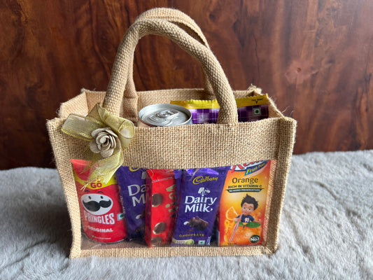 Snack Delight Rakhi Hamper with Pringles, Tong Garden Peanuts, Coke, Juice & Chocolates in Jute Gifting Bag