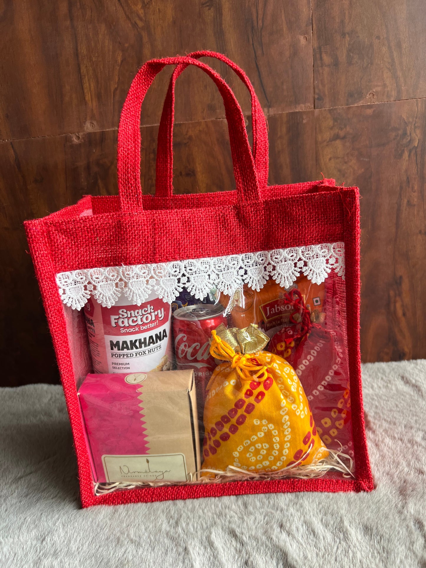 Divine Indulgence Room Hamper with Makhana, Peanuts, Coke, Incense Cones, Coated Almonds & Chocolates