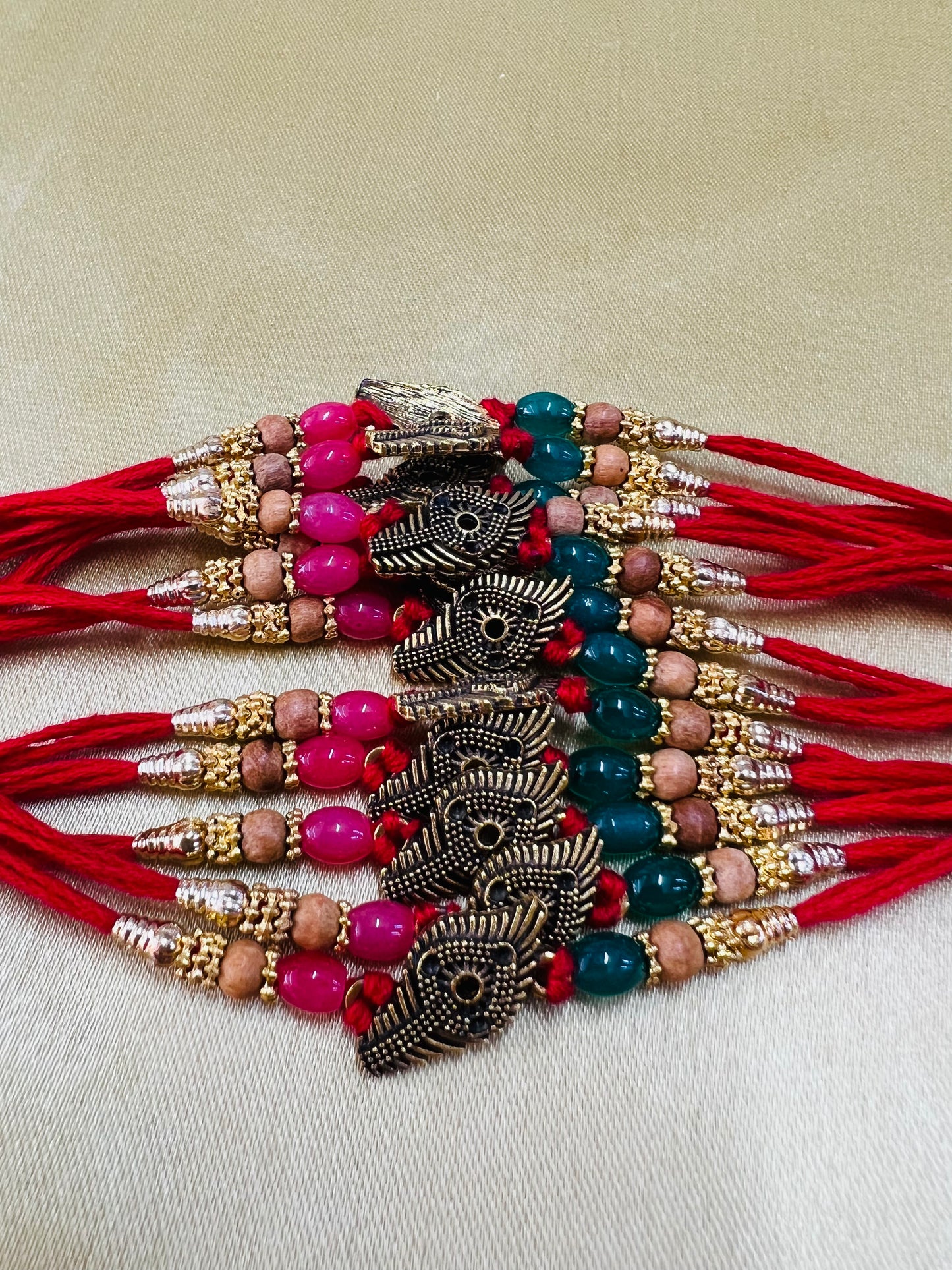 Wrap Shap R23: Designer Rakhi with Metal Feather & Colorful Beads, Roli Chawal Included