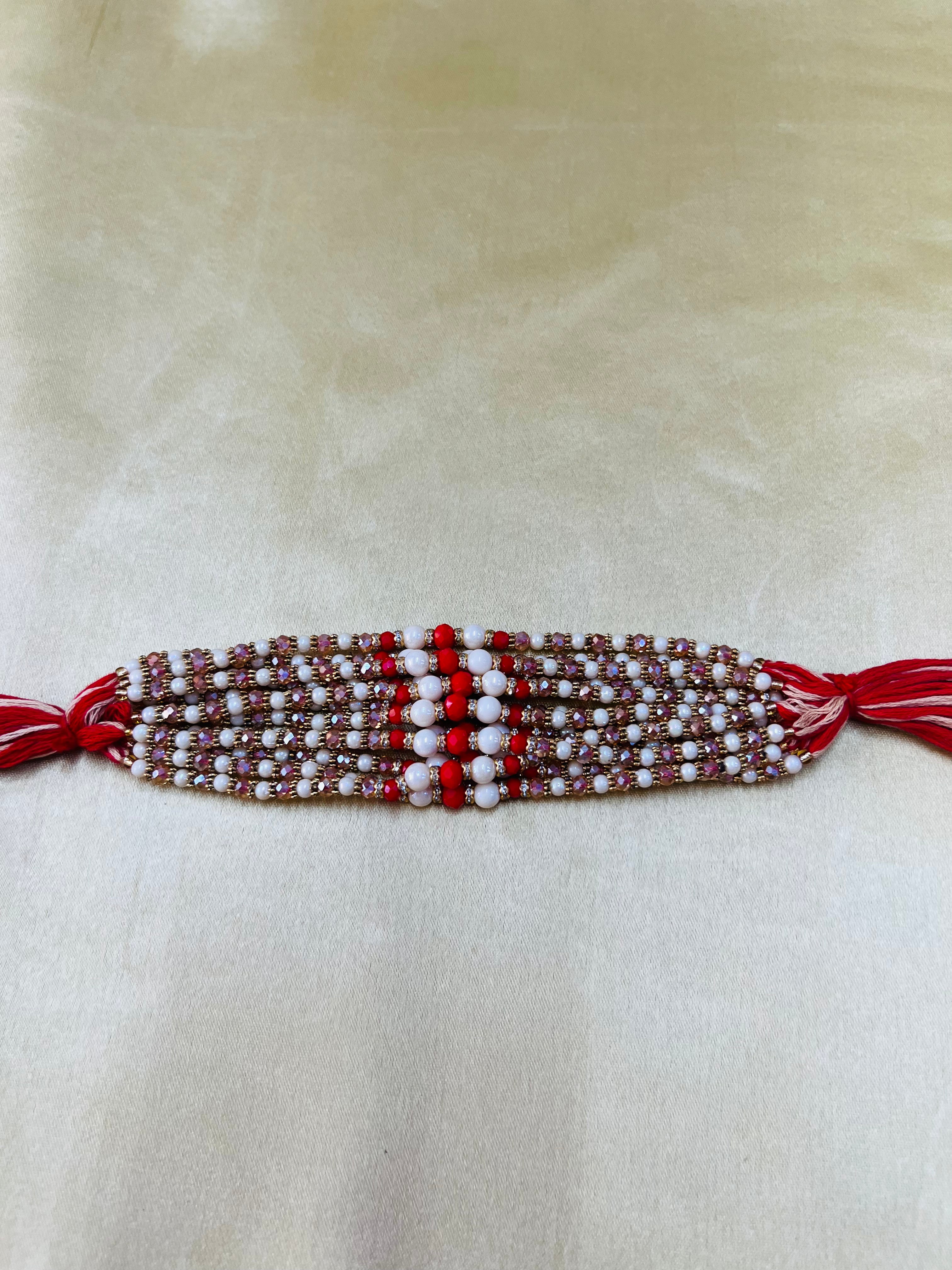 Wrap Shap WSR23-15: Designer Rakhi with Red & White Balls and Colorful Beads, Roli Chawal Included