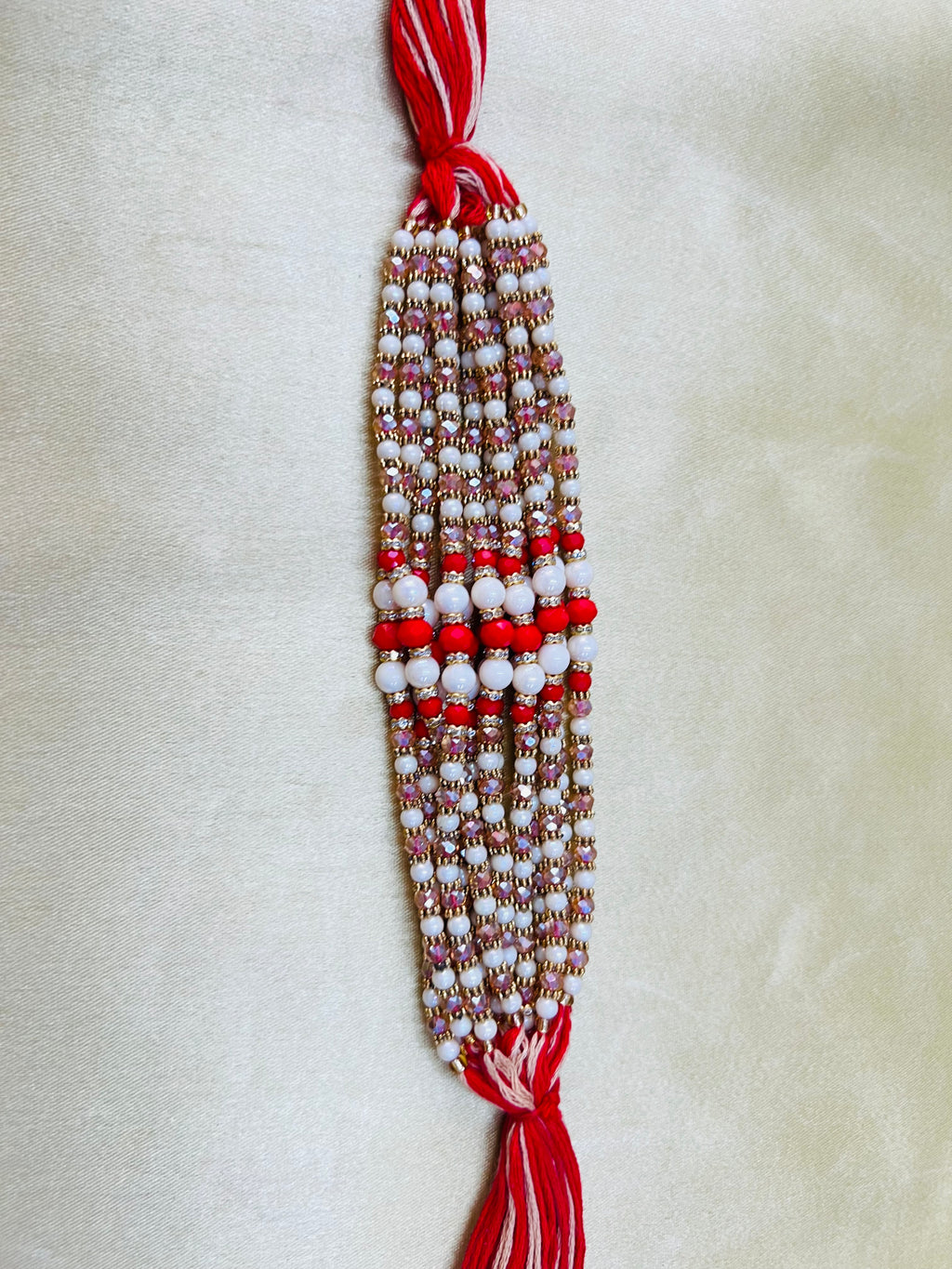 Wrap Shap WSR23-15: Designer Rakhi with Red & White Balls and Colorful Beads, Roli Chawal Included