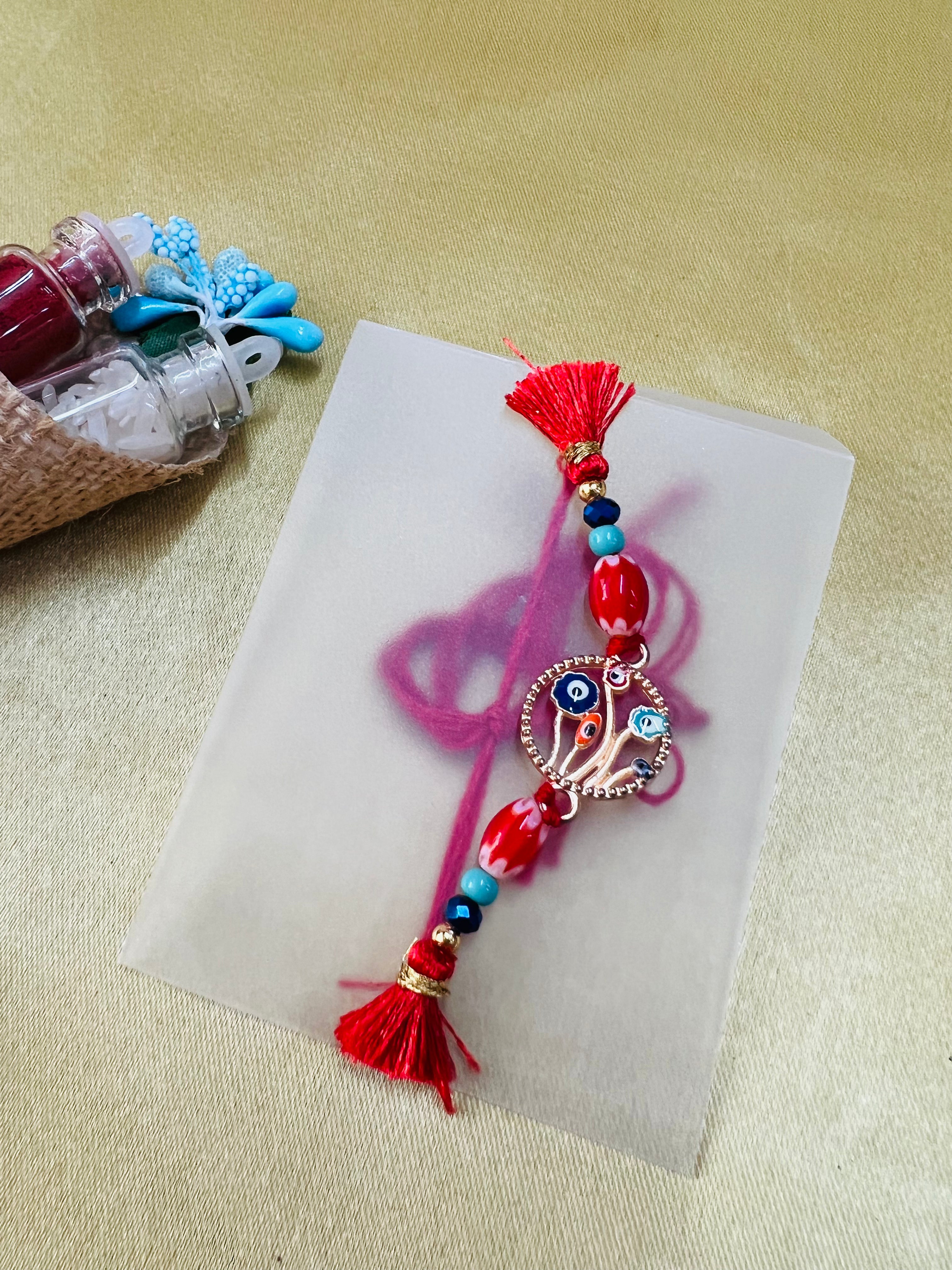 Wrap Shap BR-0107: Designer Rakhi with Evil Eye Protector and Beads, Roli Chawal Included