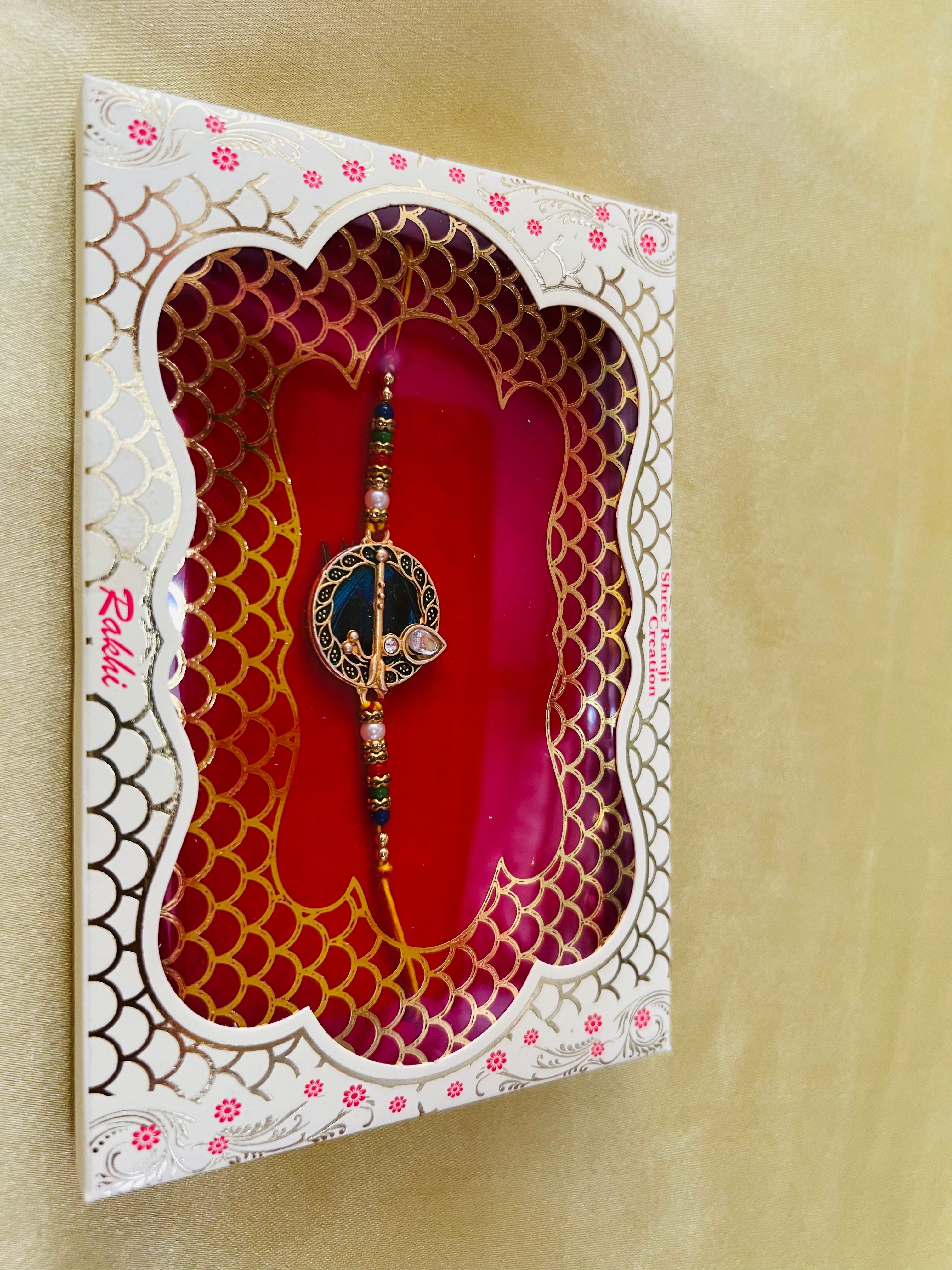 Wrap Shap GG01: Designer Rakhi with Peacock Feather and Krishna Flute Design, Roli Chawal Included