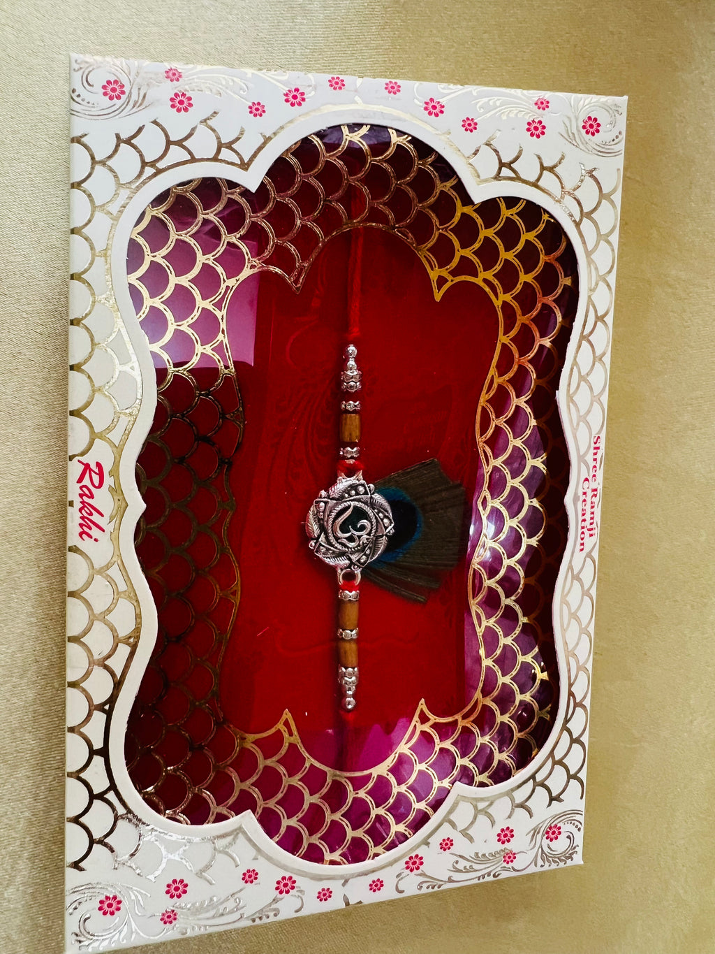 Wrap Shap GG01: Designer Rakhi with Peacock Feather and Krishna Flute Design, Roli Chawal Included