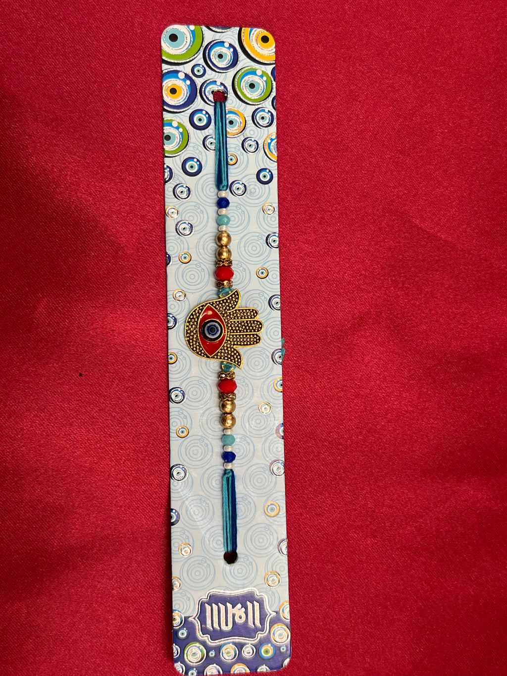 Wrap Shap 7517: Designer Rakhi with Hamsa Design Evil Eye, Roli Chawal Included
