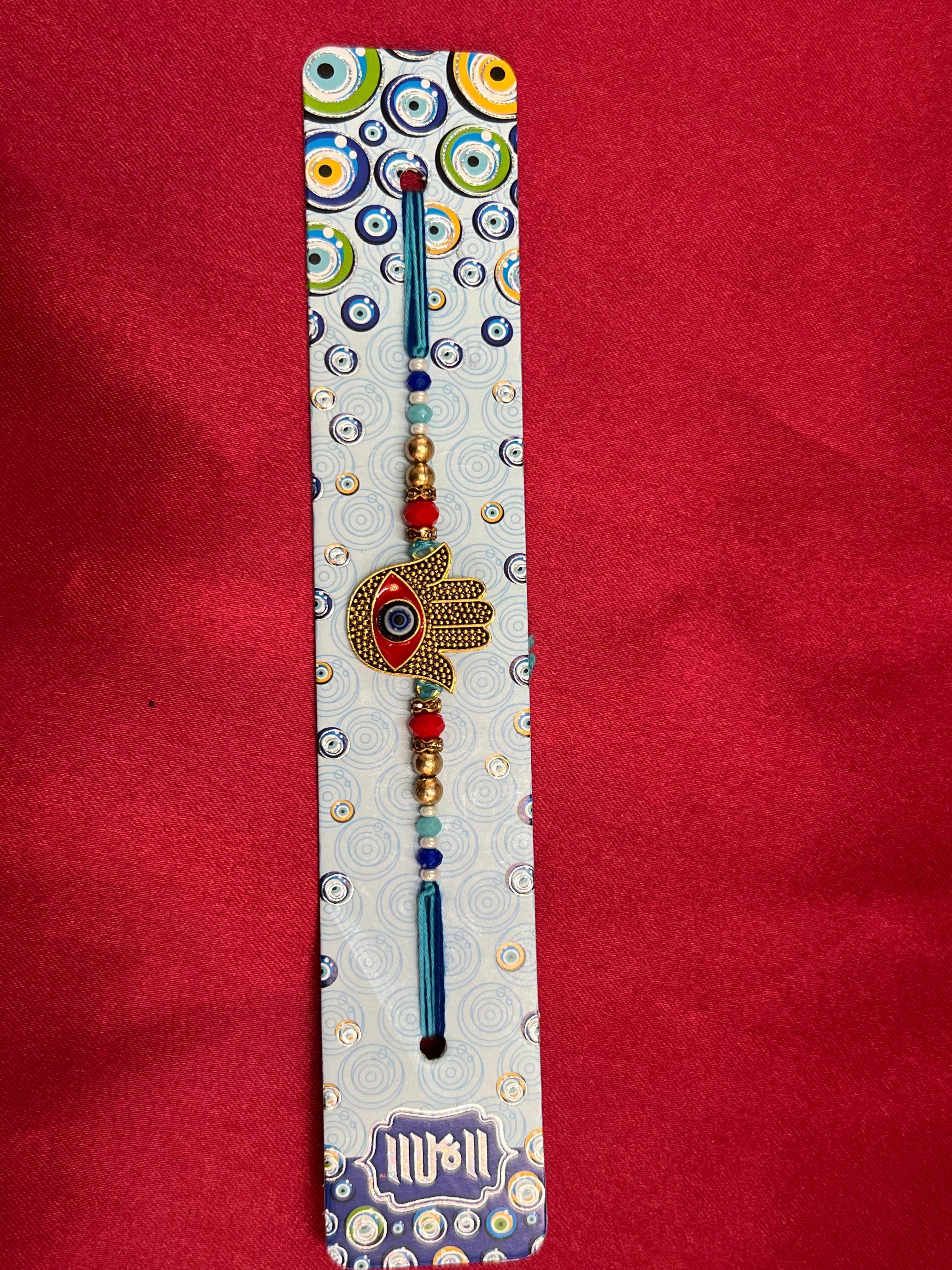 Wrap Shap 7517: Designer Rakhi with Hamsa Design Evil Eye, Roli Chawal Included