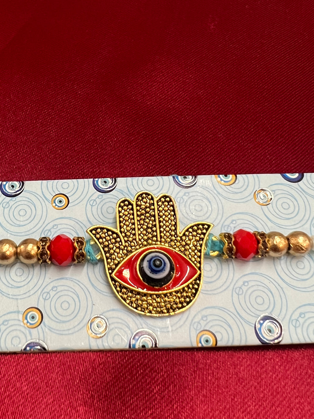 Wrap Shap 7517: Designer Rakhi with Hamsa Design Evil Eye, Roli Chawal Included