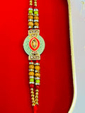 Wrap Shap EE51: Designer Rakhi with Veera, Green Bead, other Designs, Roli Chawal Included