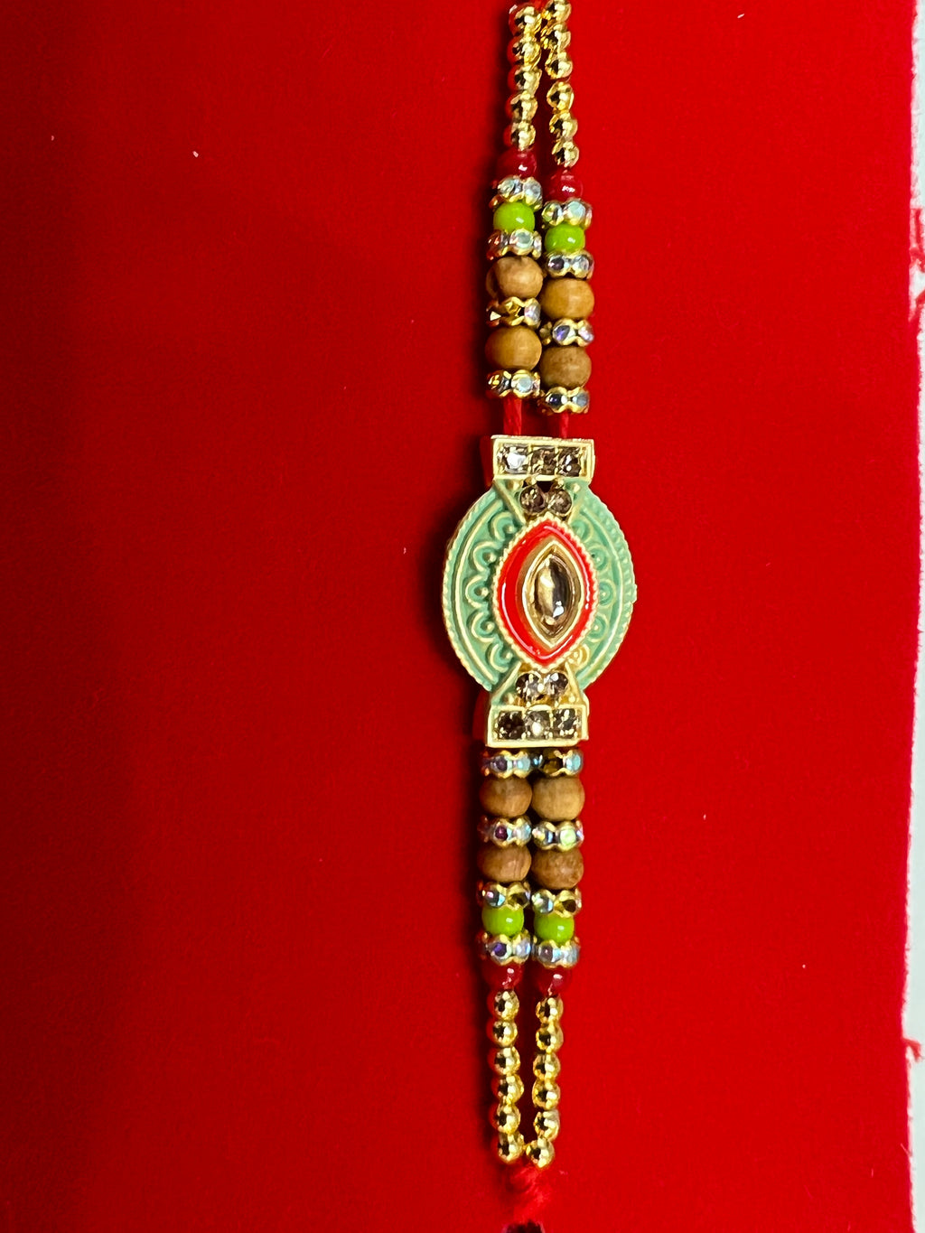 Wrap Shap EE51: Designer Rakhi with Veera, Green Bead, other Designs, Roli Chawal Included