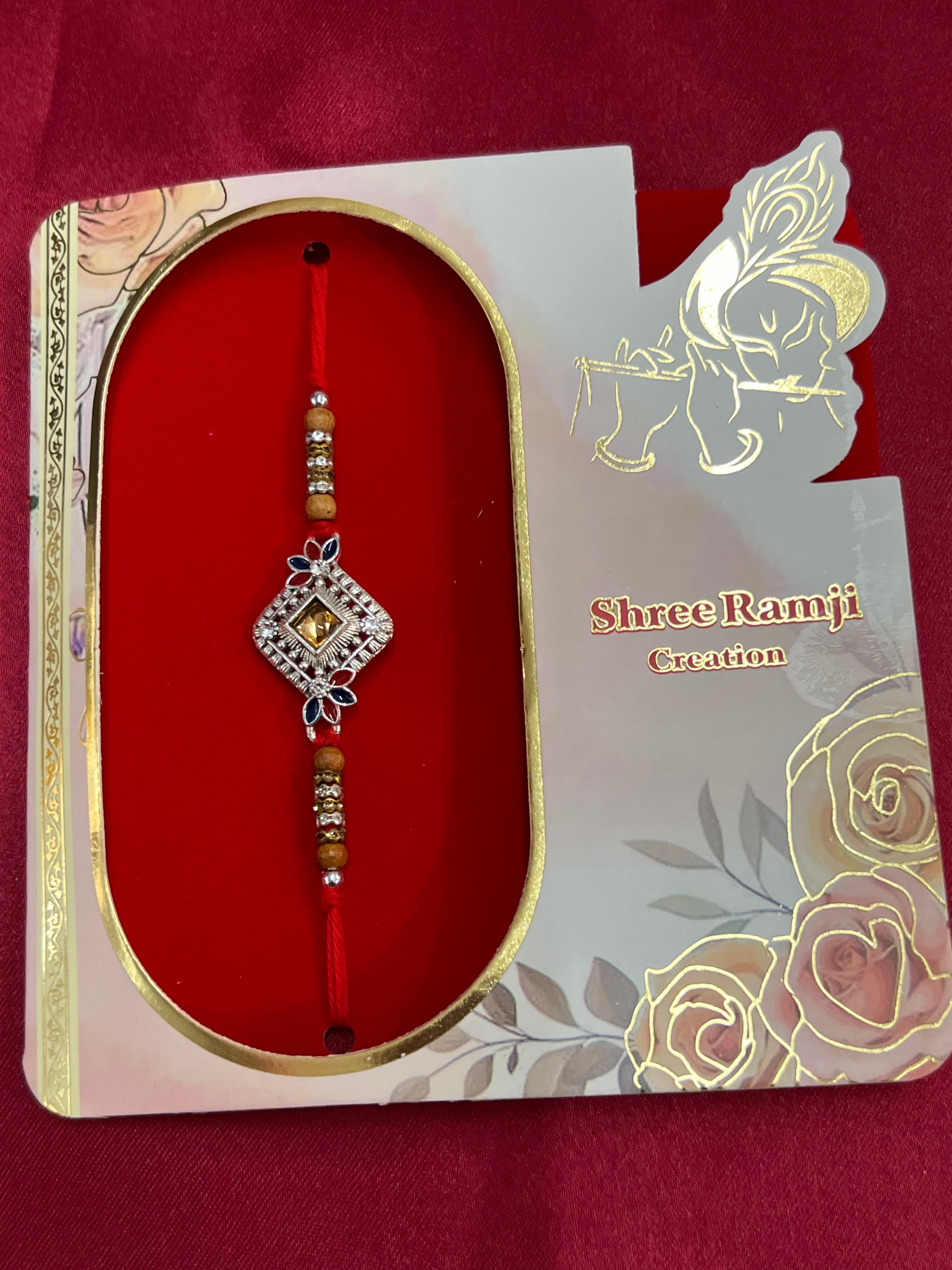 Wrap Shap EE51: Designer Rakhi with Veera, Green Bead, other Designs, Roli Chawal Included