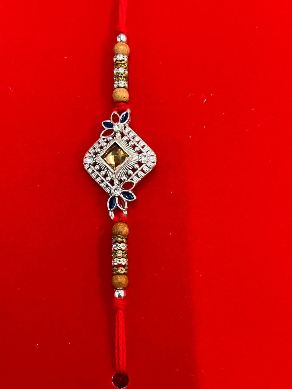 Wrap Shap EE51: Designer Rakhi with Veera, Green Bead, other Designs, Roli Chawal Included