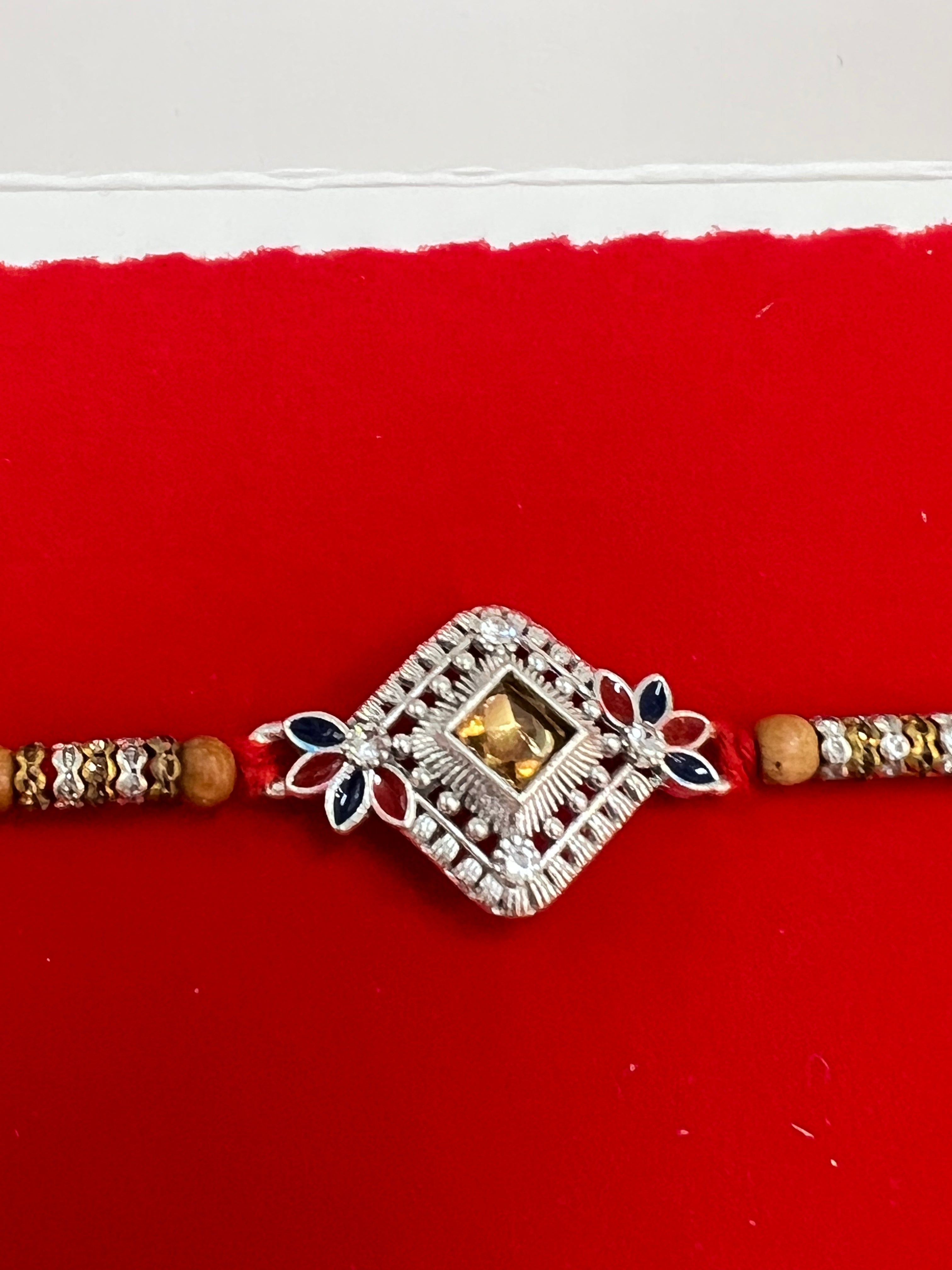 Wrap Shap EE51: Designer Rakhi with Veera, Green Bead, other Designs, Roli Chawal Included