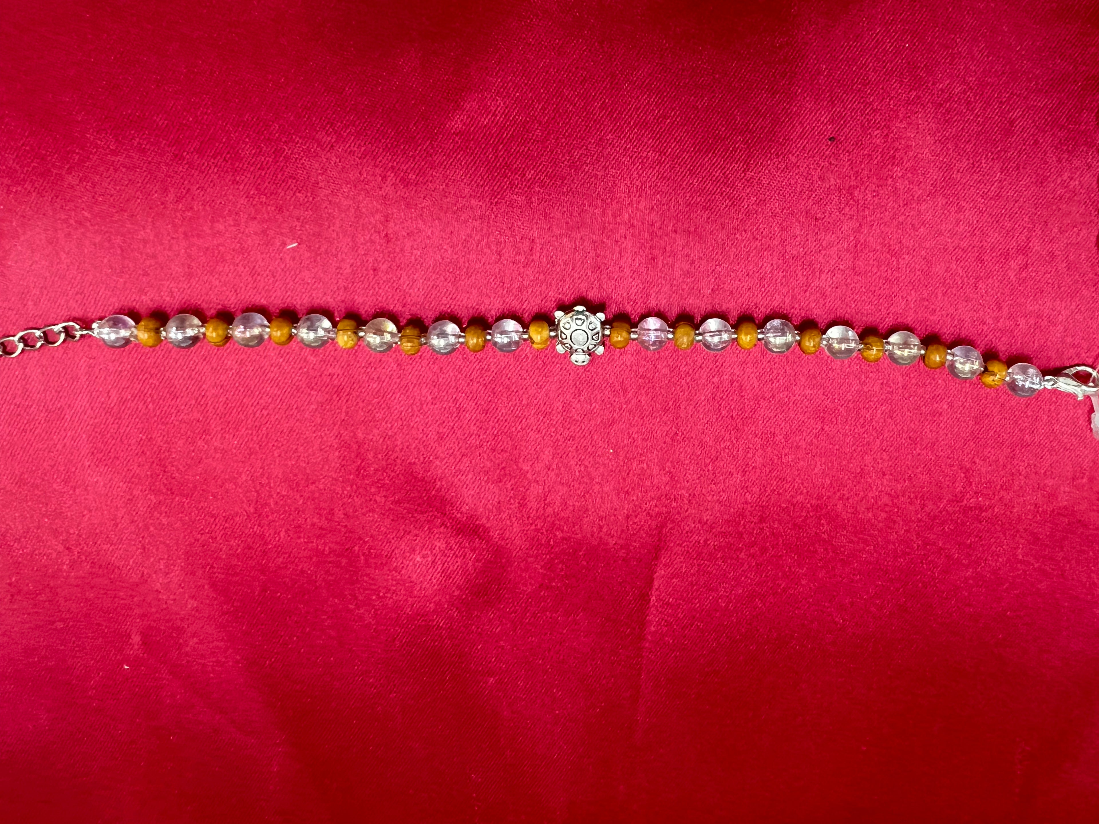 Wrap Shap Designer Bracelet Rakhi with Tortoise and Transparent Beads, Roli Chawal Included