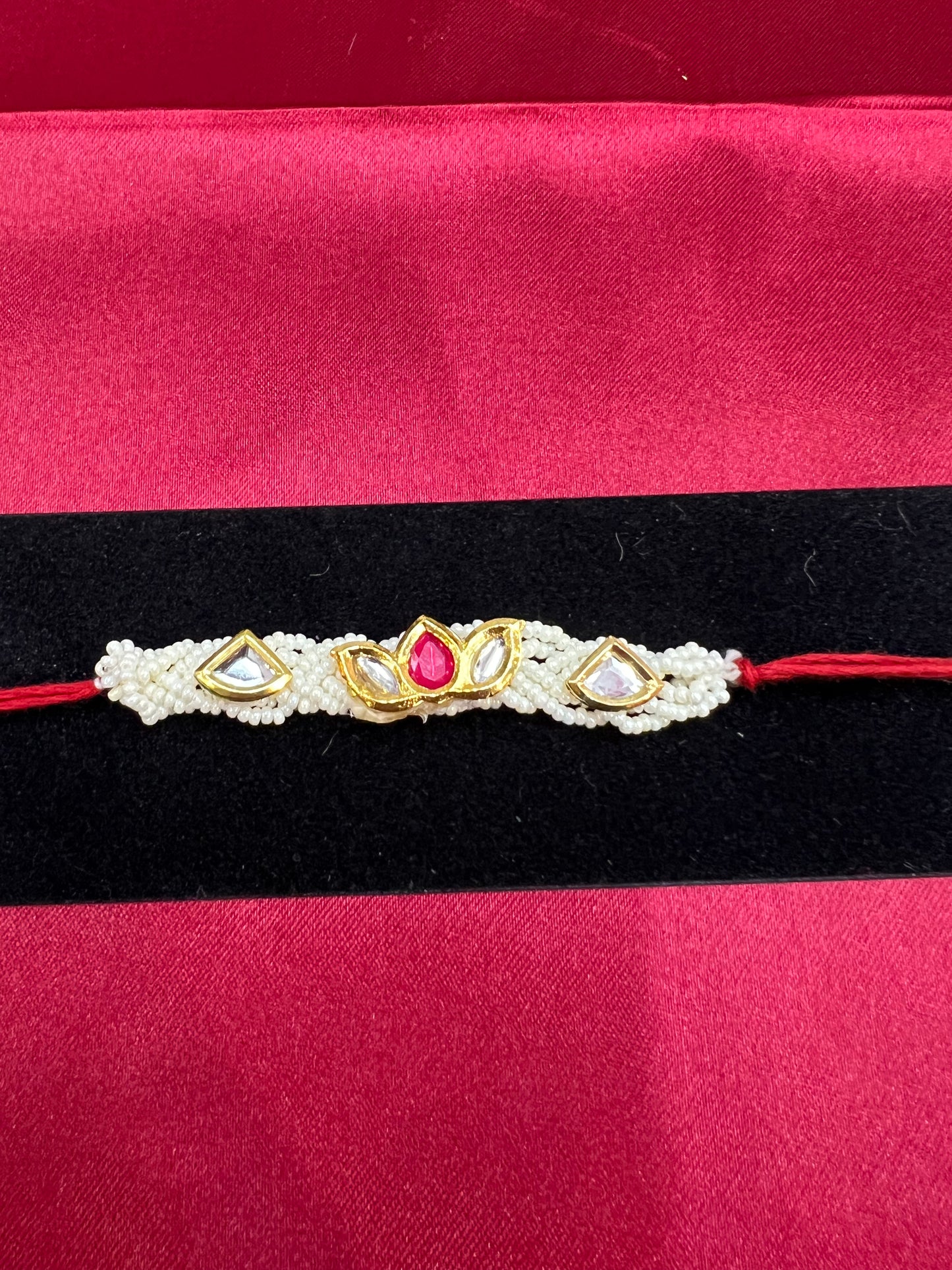 Wrap Shap R80: Designer White Beads Rakhi with Lotus Design Stones, Roli Chawal Included