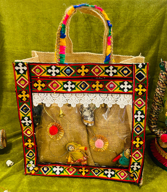 Lohri Hamper in a Decorated Jute Bag with 500gms Moongfali & 500gms Revdi in Jute Potlis