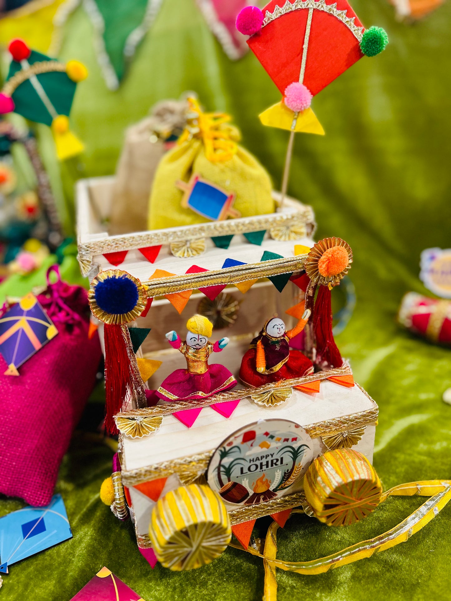 Unique Lohri Hamper in a Decorated Truck-Shaped Basket with Gajak, Revdi, Moongfali, Til Gajak & Instant Popcorn