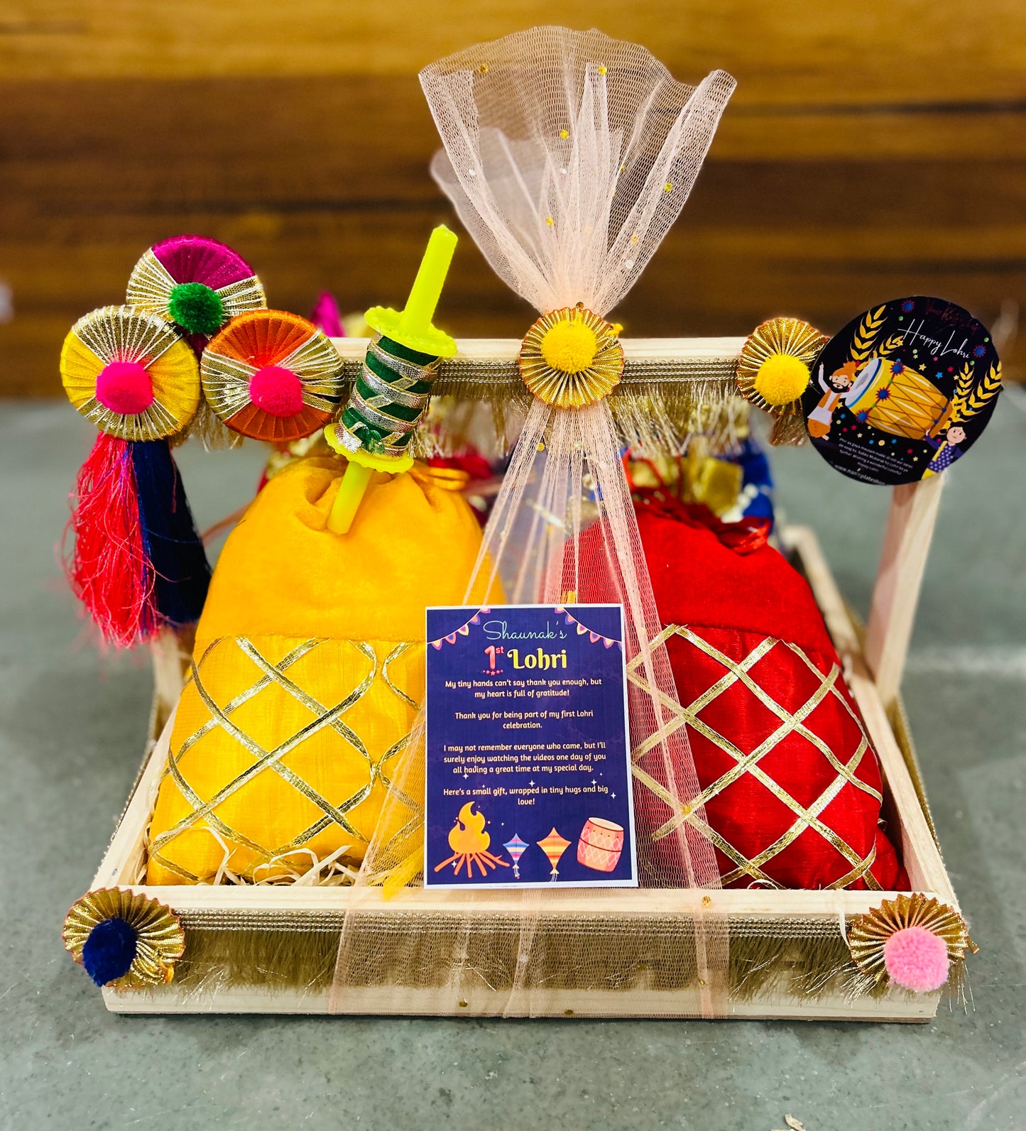 Traditional Lohri Hamper in a Decorated Pinewood Basket with Gajak, Revdi, Moongfali & Popcorn