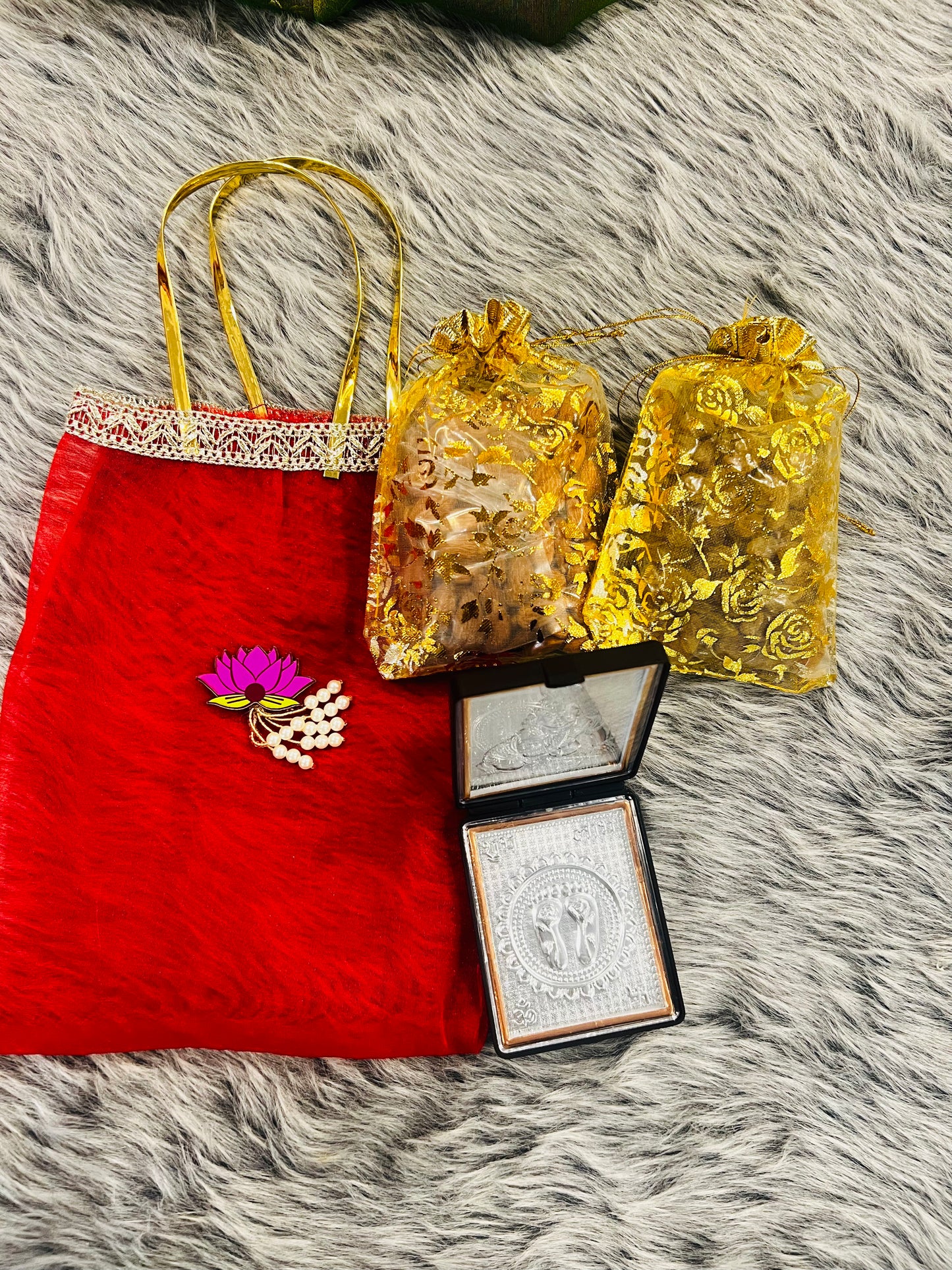 Premium Return Gift Hamper with Almonds, Raisins, Silver Polished Laxmi Charan Paduka in Lotus Decorated Tissue Bag