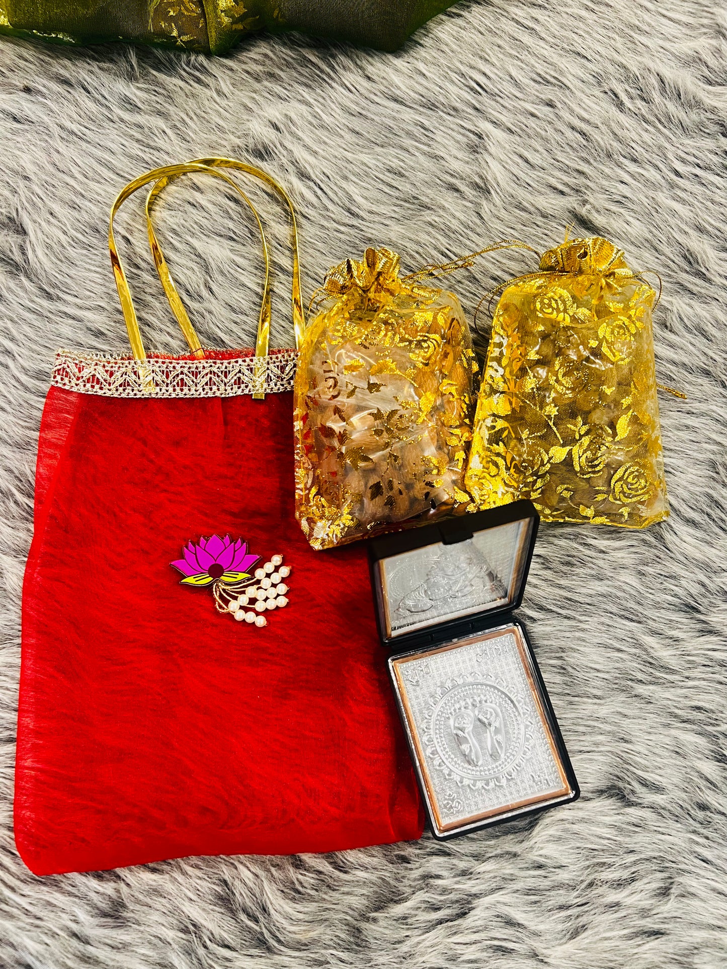 Premium Return Gift Hamper with Almonds, Raisins, Silver Polished Laxmi Charan Paduka in Lotus Decorated Tissue Bag