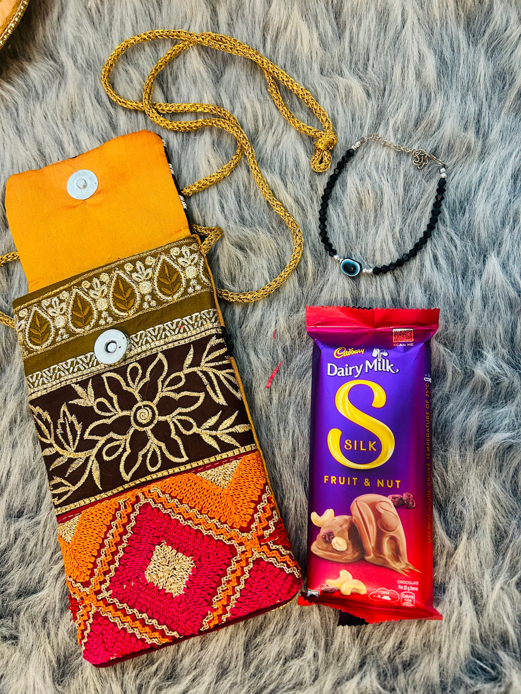 Elegant Gift Hamper – Evil Eye Bracelet & Chocolate in a Traditional Mobile Sling Bag | Birthday, Anniversary & Wedding Favor